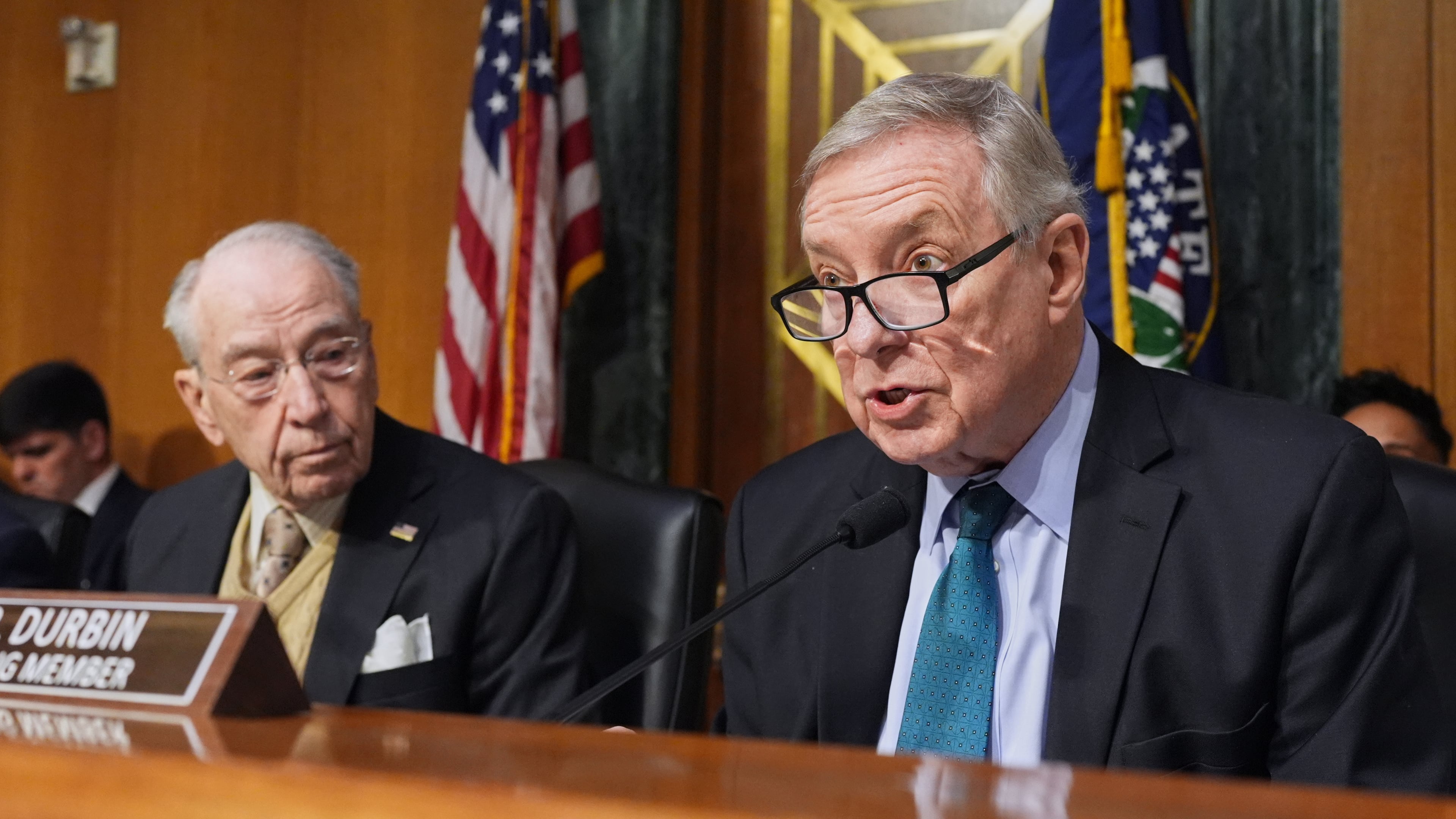 FILE - Sen. Dick Durbin, D-Ill., speaks as Chairman of the Senate Judiciary Committee, Sen. Chuck Grassley, R-Iowa, listens during an oversight hearing at the Capitol in Washington, Tuesday, March 3, 2026. (AP Photo/J. Scott Applewhite, File)