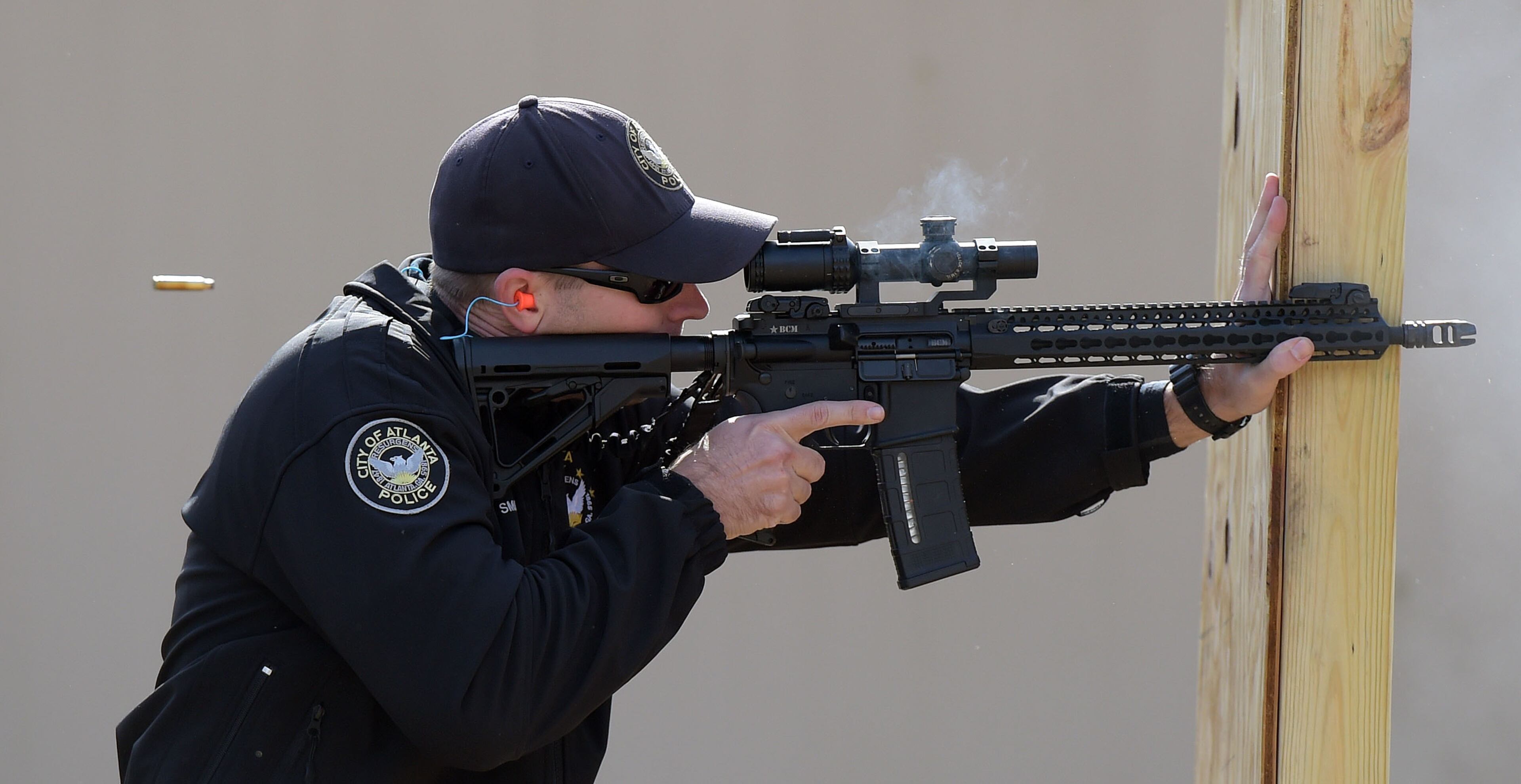 NOVEMBER 24, 2015 ATLANTA APD Officer B. Smith fires downrange during the training. Officers with the Atlanta Police Department conduct advanced patrol rifle training at its firearms range Tuesday, November 24, 2015. KENT D. JOHNSON/ kdjohnson@ajc.com