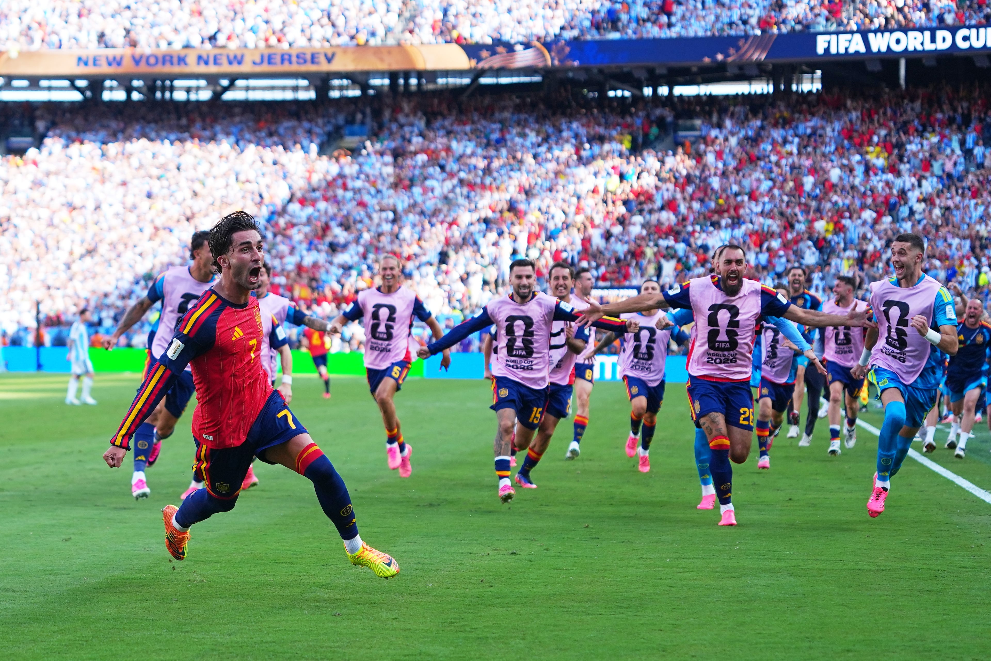 Spain's Ferran Torres (front left) celebrates scoring their first goal during the World Cup final soccer match between Spain and Argentina in East Rutherford, N.J., near New York, Sunday, July 19, 2026. (Julio Cortez/AP)