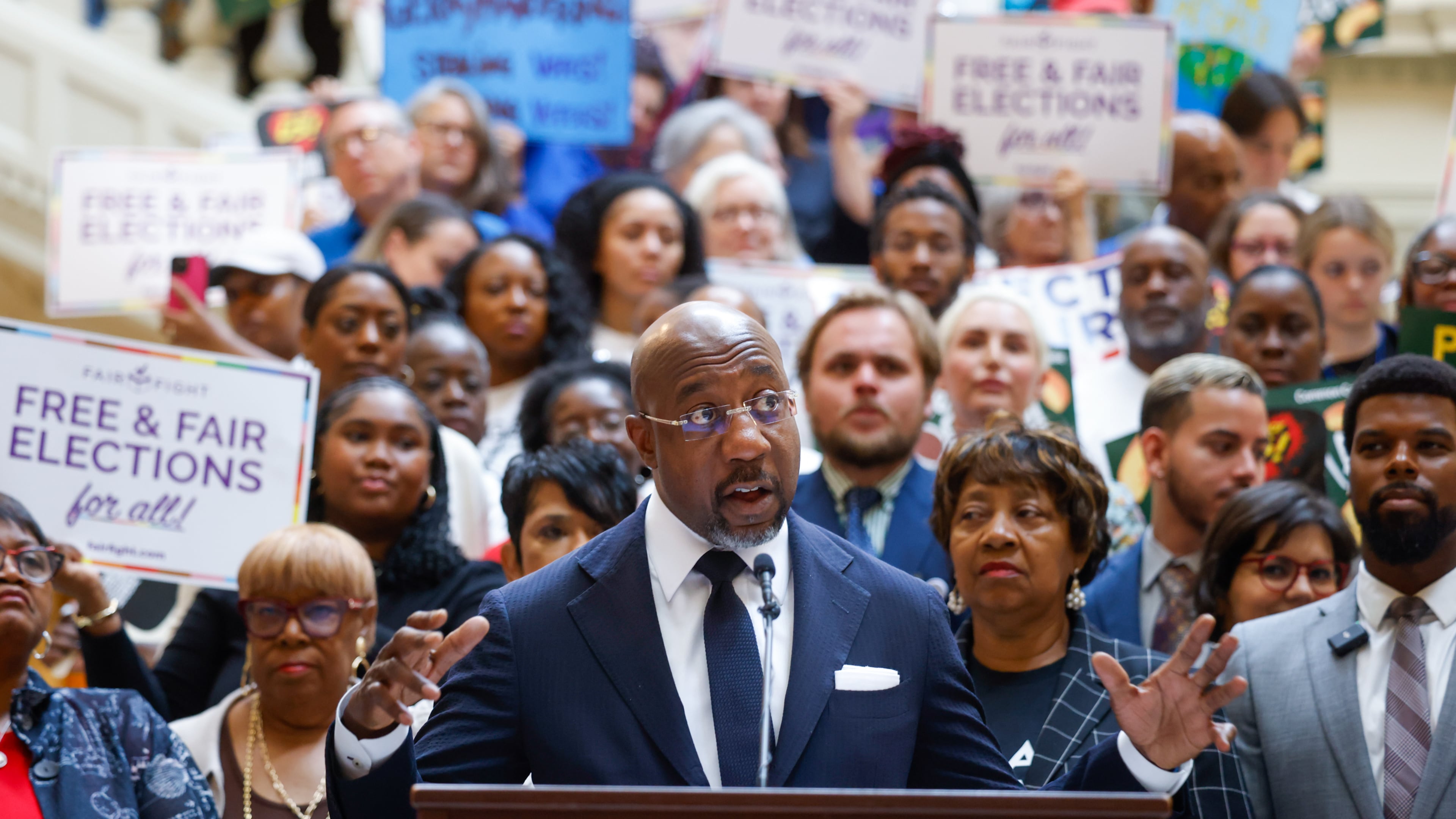 Democratic U.S. Sen. Raphael Warnock speaks during a news conference before the state Legislature convenes for a special session on Wednesday, June 17, 2026, in Atlanta. Georgia Republican leaders later announced they wouldn’t redraw the state’s political maps during the session. (Arvin Temkar/AJC)