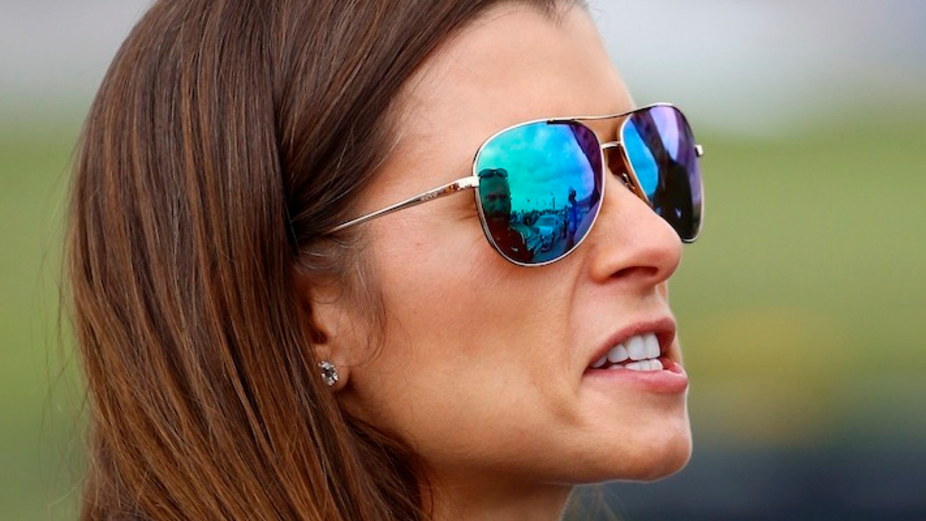 Danica Patrick waits to qualify during qualifying for the NASCAR Cup Series auto race at Talladega Superspeedway, Saturday, Oct. 14, 2017, in Talladega, Ala. (AP Photo/Butch Dill)