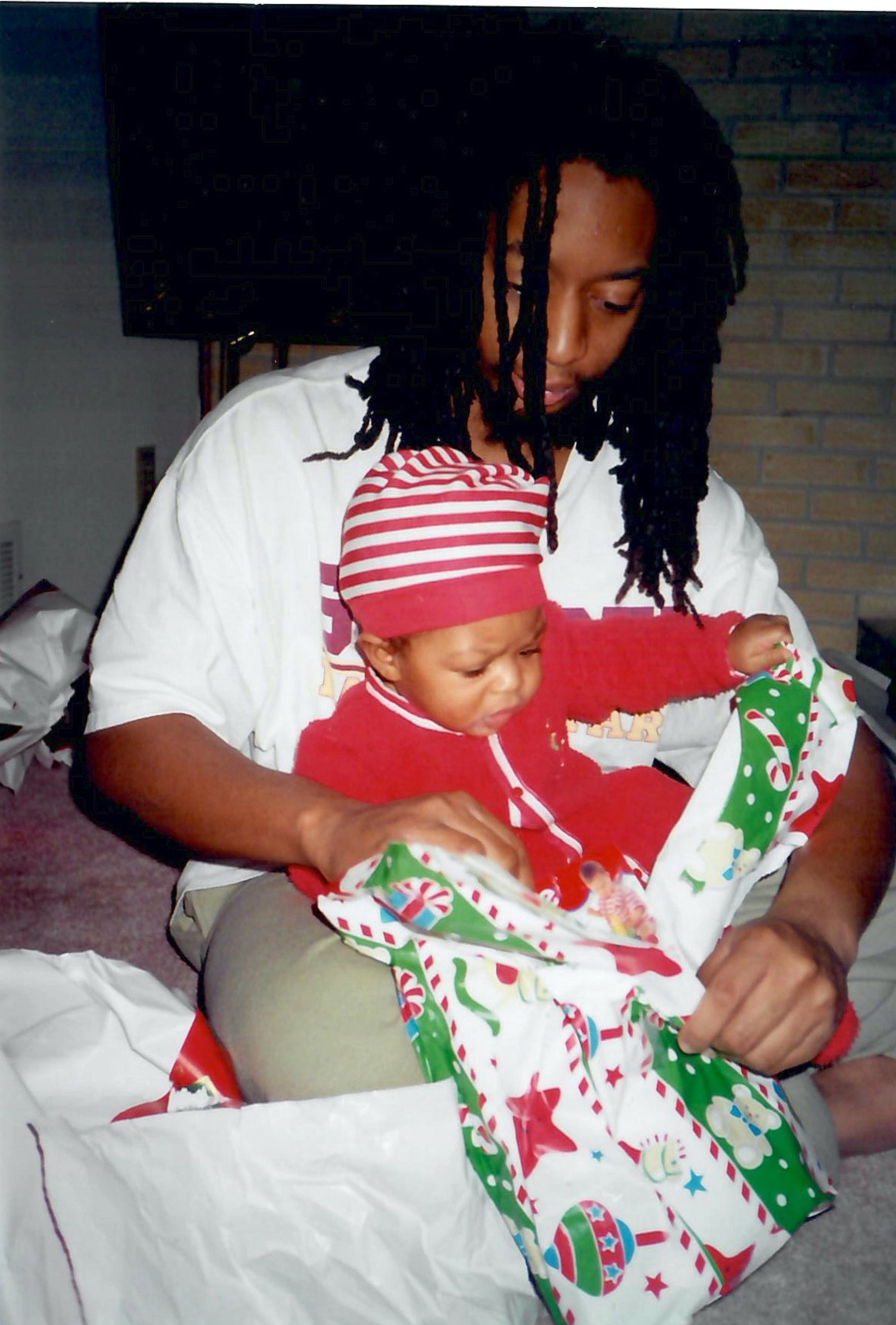 Lil Jon's son, Nathan "Slade" Smith (pictured here as a baby with his dad), died from an accidental drowning in February, after his body was recovered from a pond near his Milton home. (Courtesy of Lil Jon)