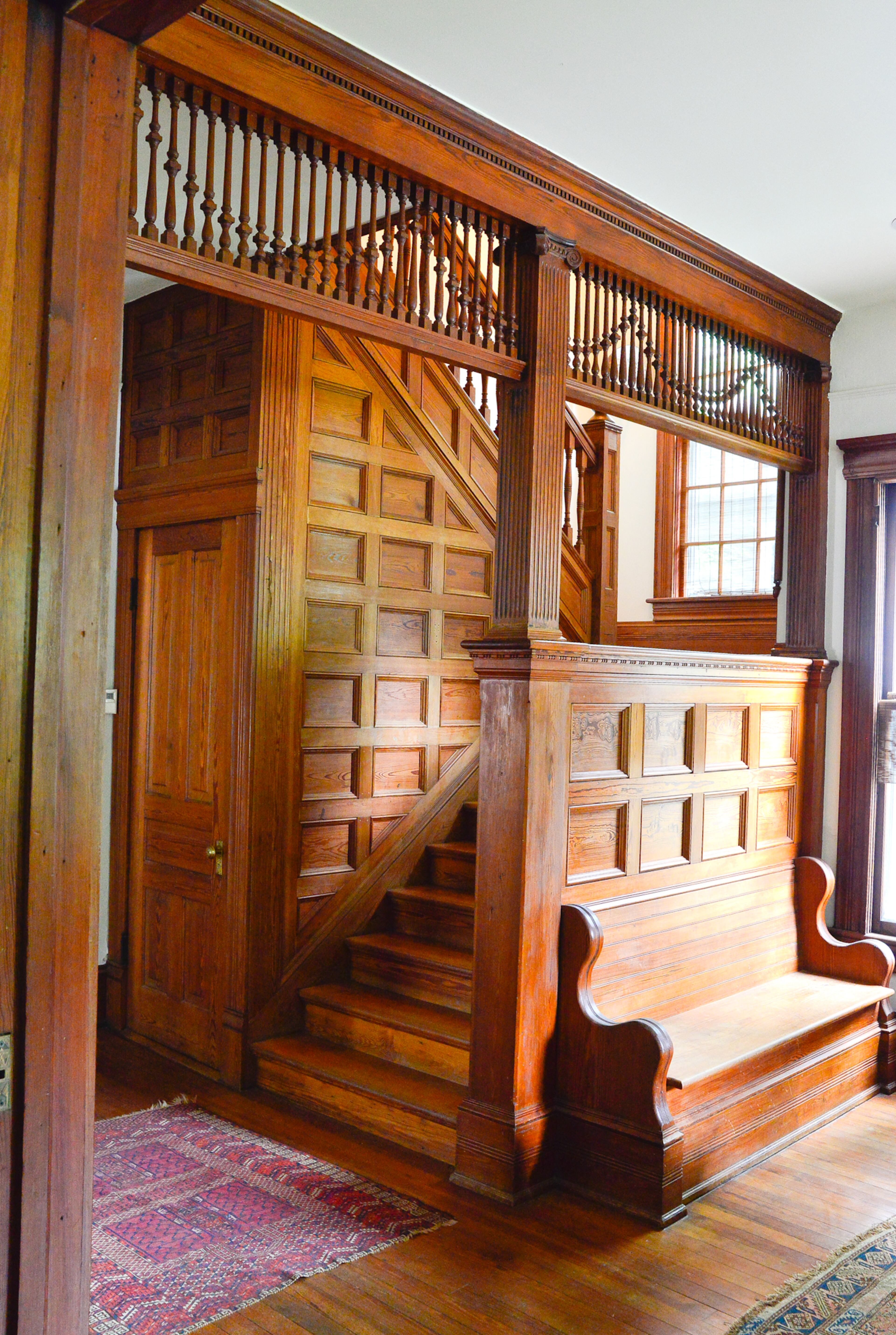 An heirloom Victorian sofa, which Elliott Niespodziani acquired from her family, anchors the grand foyer, complete with the original fireplace. Elliott, a senior publicist for Adult Swim, and her husband have embraced their Atlanta home's Victorian roots, while adding their own eclectic touches throughout.