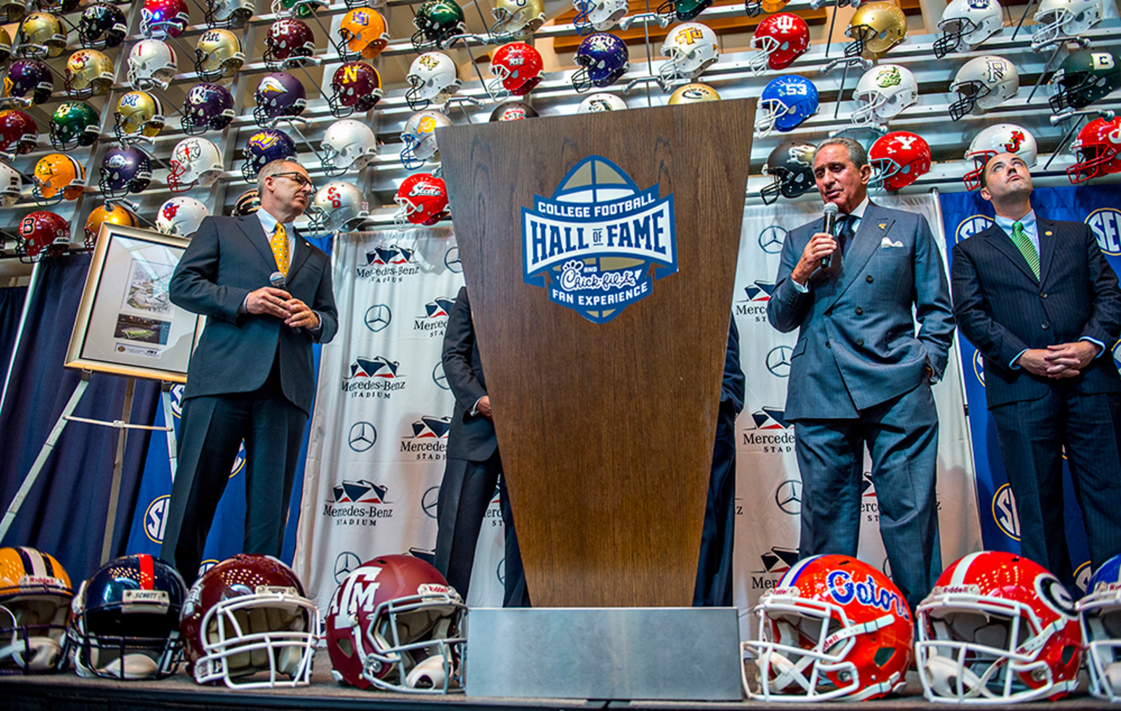 SEC Commissioner Greg Sankey (left) and Atlanta Falcons owner Arthur Blank answer questions Tuesday during the press conference announcing a 10-year deal at the College Football Hall of Fame in Atlanta to play the SEC Championship game at Mercedes-Benz Stadium.