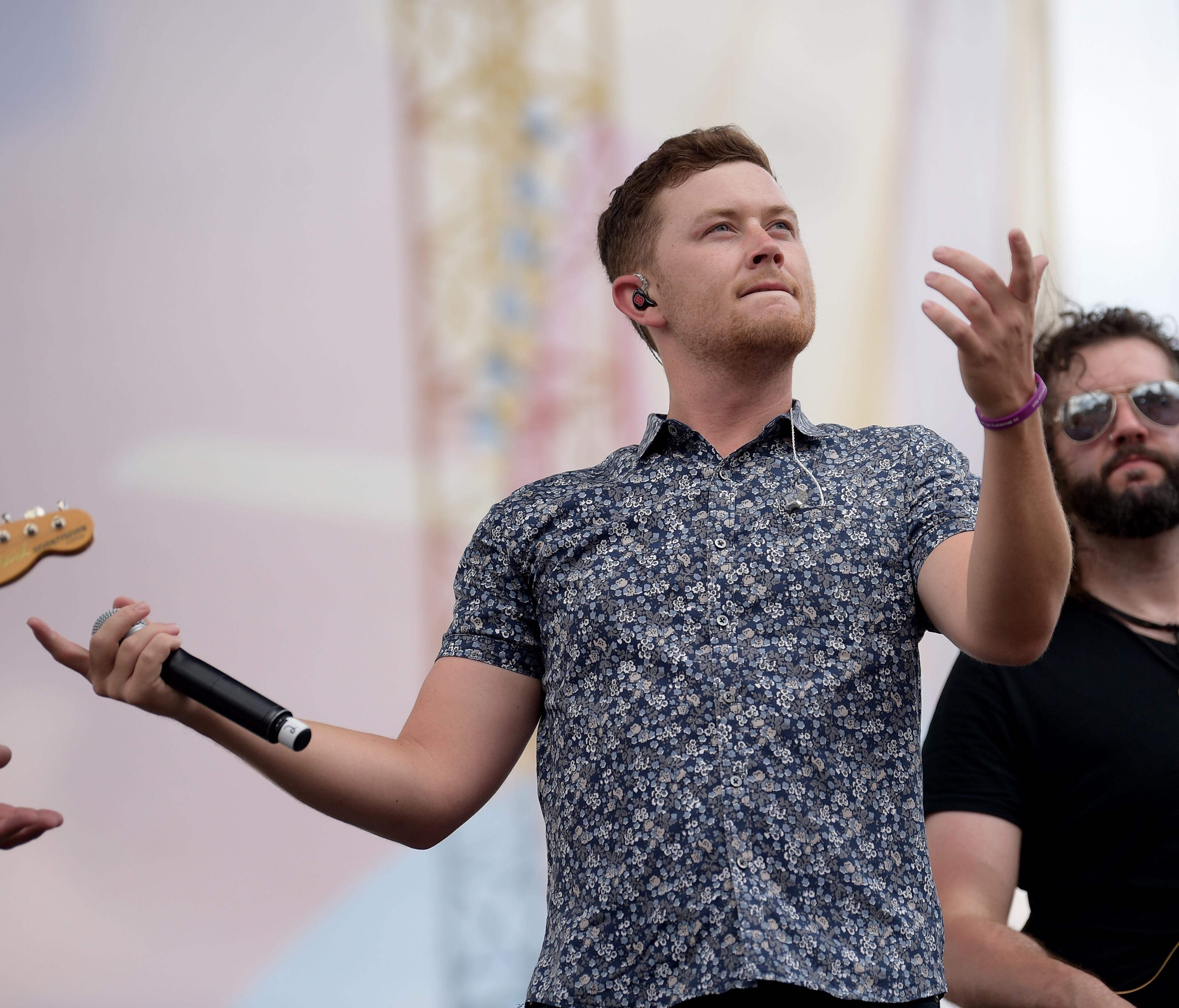 NASHVILLE, TN - JUNE 10: (EDITORIAL USE ONLY) Scotty McCreery performs onstage during the 2018 CMA Music festival at the Chevy Riverfront Stage on June 10, 2018 in Nashville, Tennessee. (Photo by Jason Kempin/Getty Images)