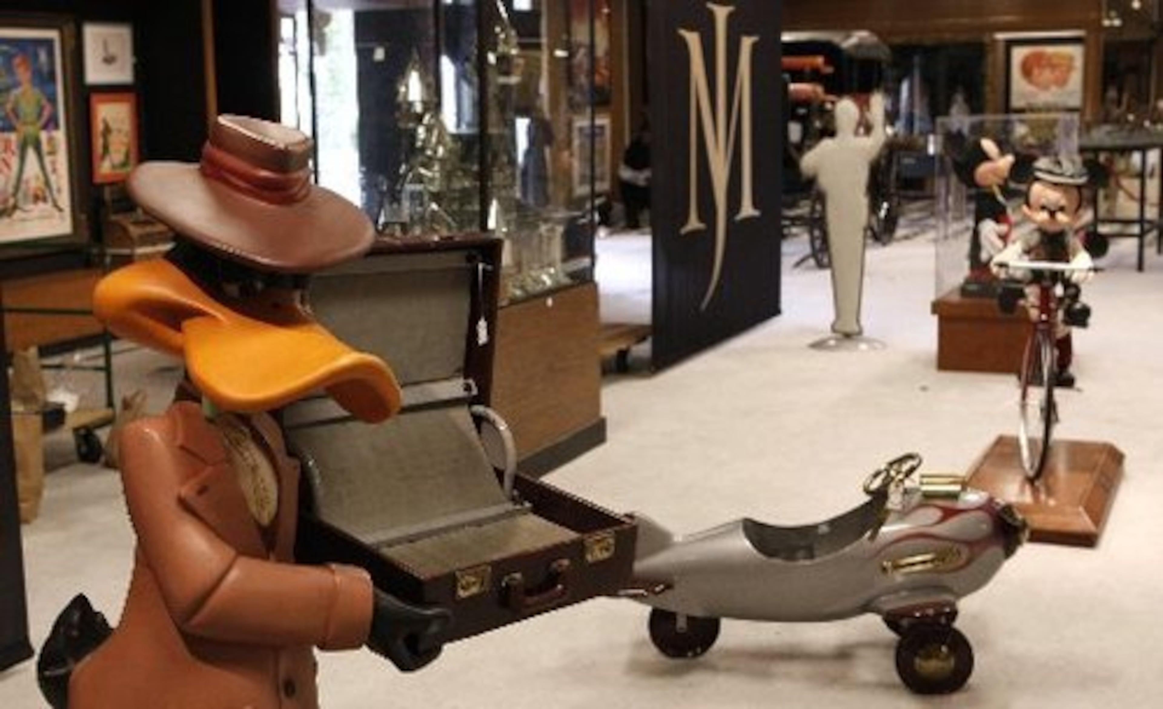 The auction would have included "amusements, arcade games, Disneyana, entertainment memorabilia, garden statuary and furniture," according to the Julien's Auctions web site. Darren Julien expected the auction to bring in about $12 million.