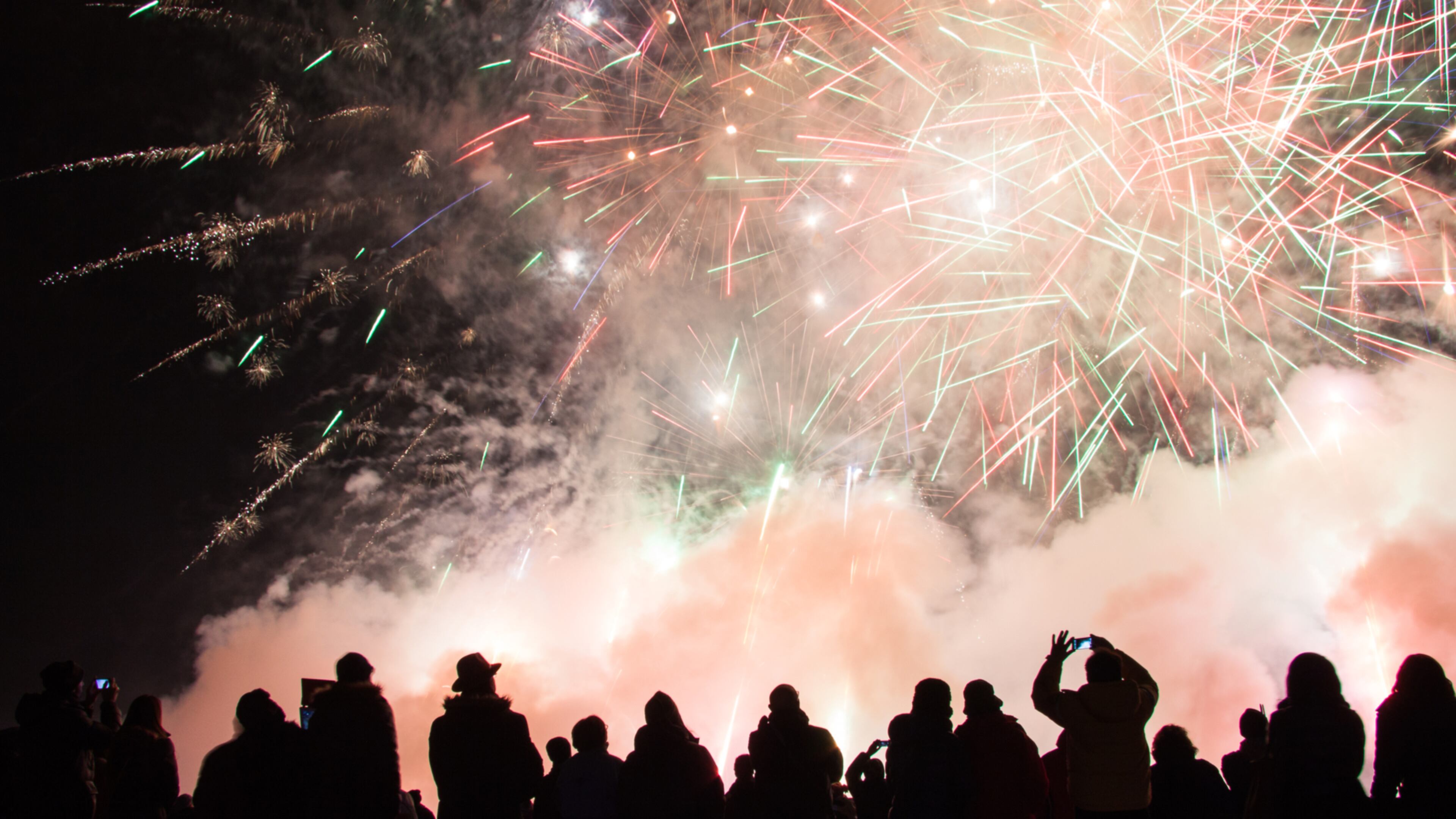 Smoke rises from fireworks during a Fourth of July celebration.