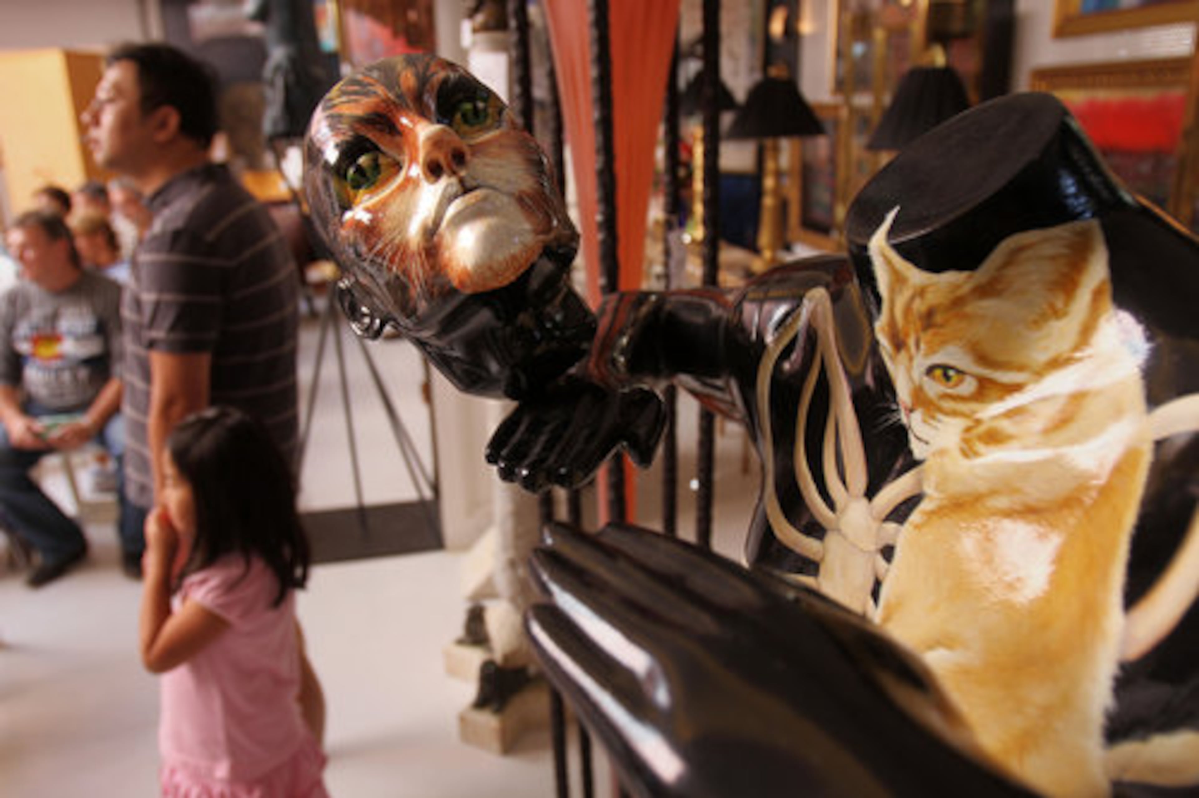 Collectibles, bookcases, tables and chairs were among the auction items.