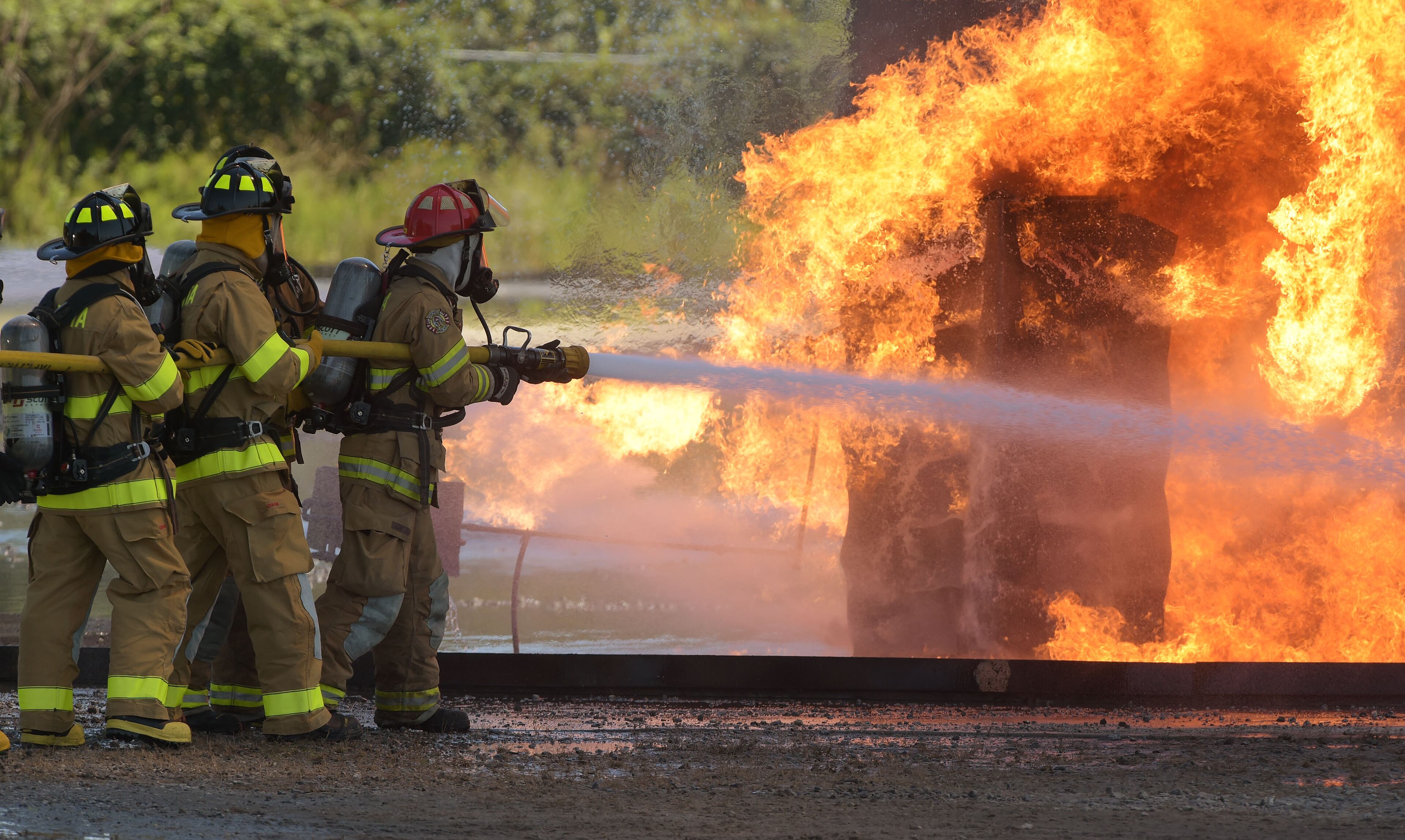 SEPTEMBER 14, 2015 ATLANTA Atlanta Fire Rescue Department firefighters hosted live fire training for attendees at the Aircraft Rescue Fire Fighting (ARFF) Conference, Monday, September, 14, 2015. Firefighters from across the world, battled a simulated fire in an engine and landing gear and also a cascade fire with wing and fuel tanks. Firefighters were Atlanta this week for the 26th Annual ARFF Working Group Conference and Educational Symposium. One of the highlights of the conference was the live fire training at the Hartsfield-Jackson firefighter training site. KENT D. JOHNSON/KDJOHNSON@AJC.COM