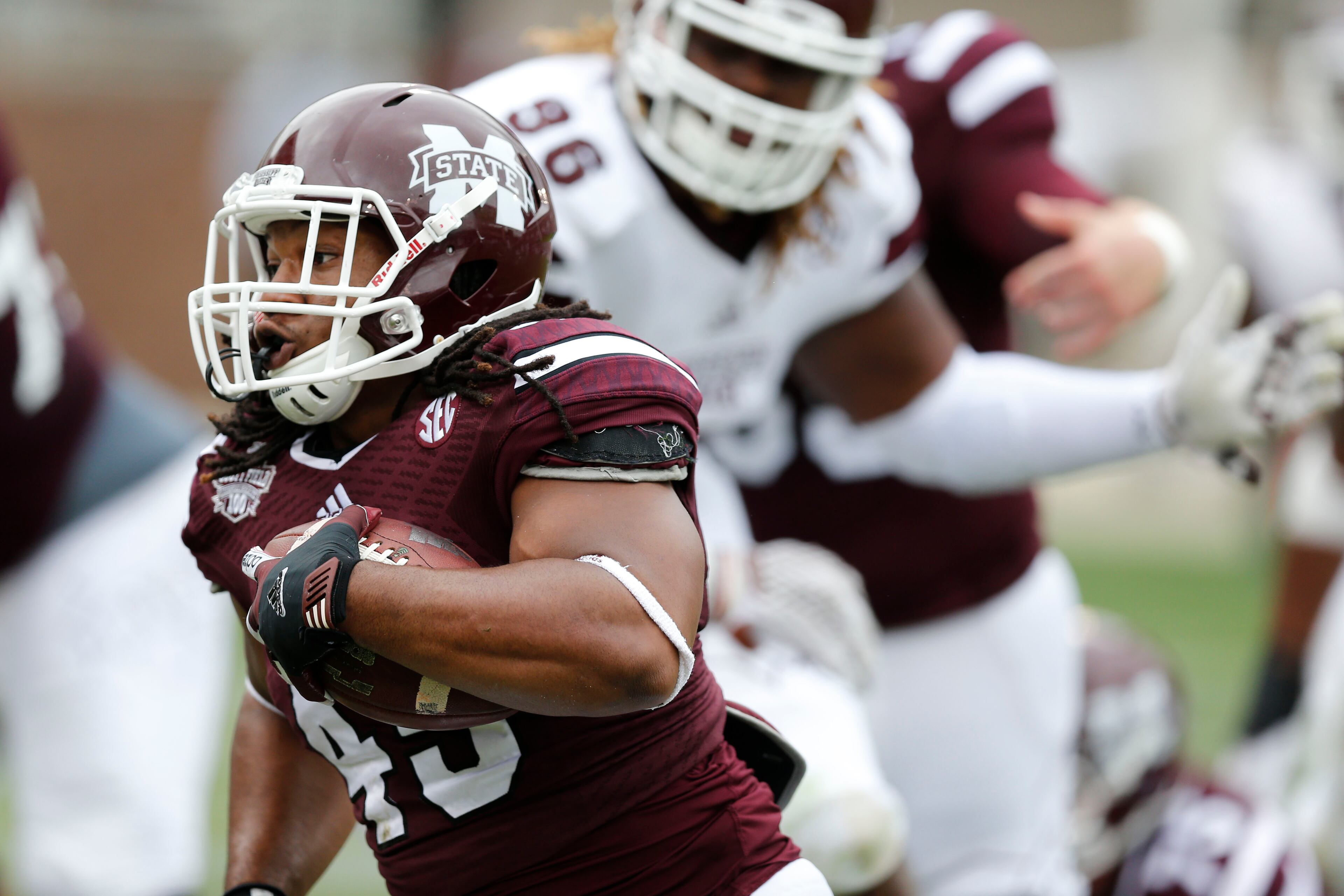 Mississippi State Maroon squad running back Tiberias Lampkin (45) runs upfield for a second half touchdown against the White squad at an NCAA college football spring game, Saturday, April 16, 2015, in Starkville, Miss. The Maroon won 34-21. (AP Photo/Rogelio V. Solis)