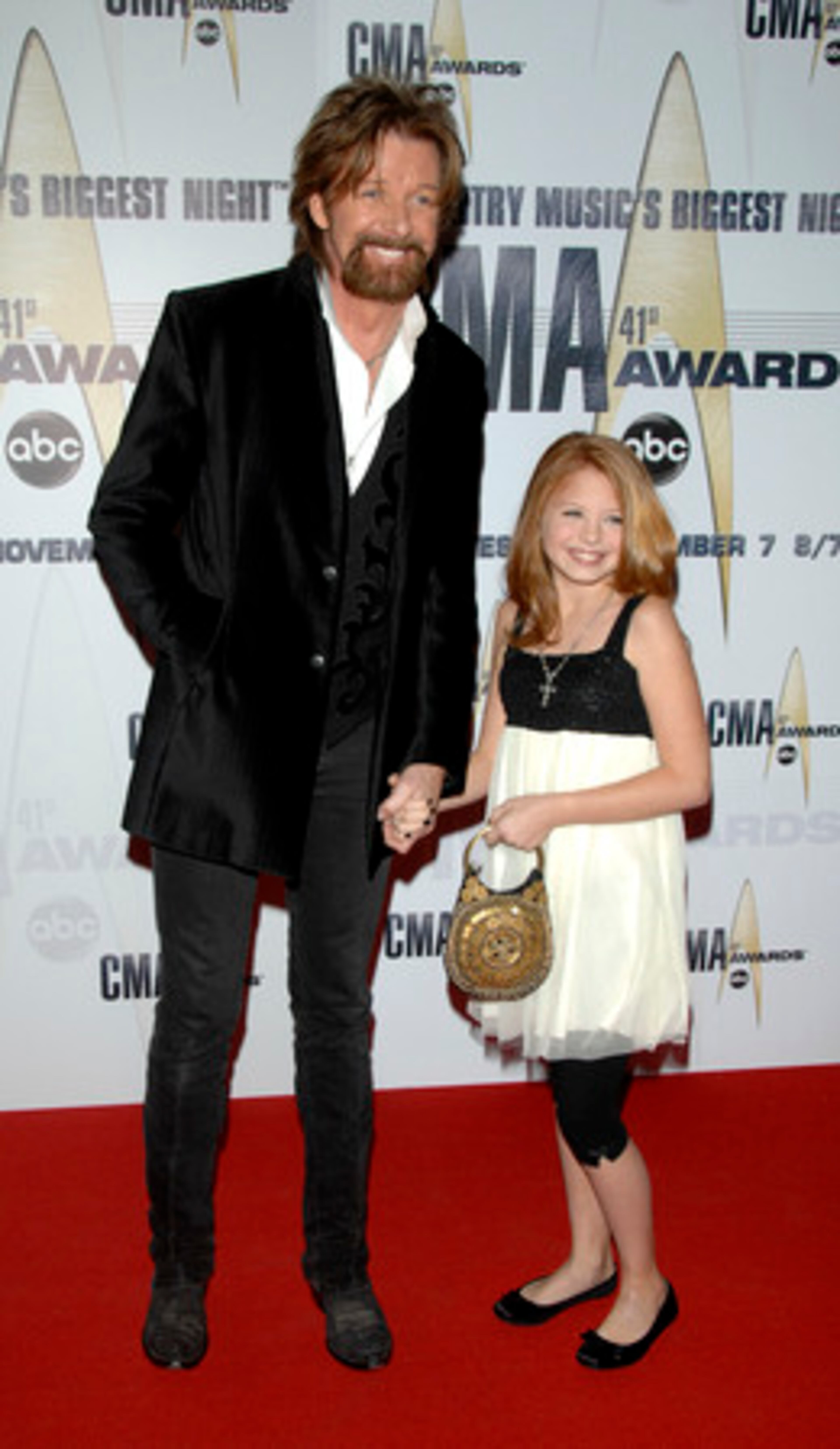 Ronnie Dunn of Brooks & Dunn with daughter Haley: Brooks & Dunn have gathered 20 CMA awards and 26 ACM awards.