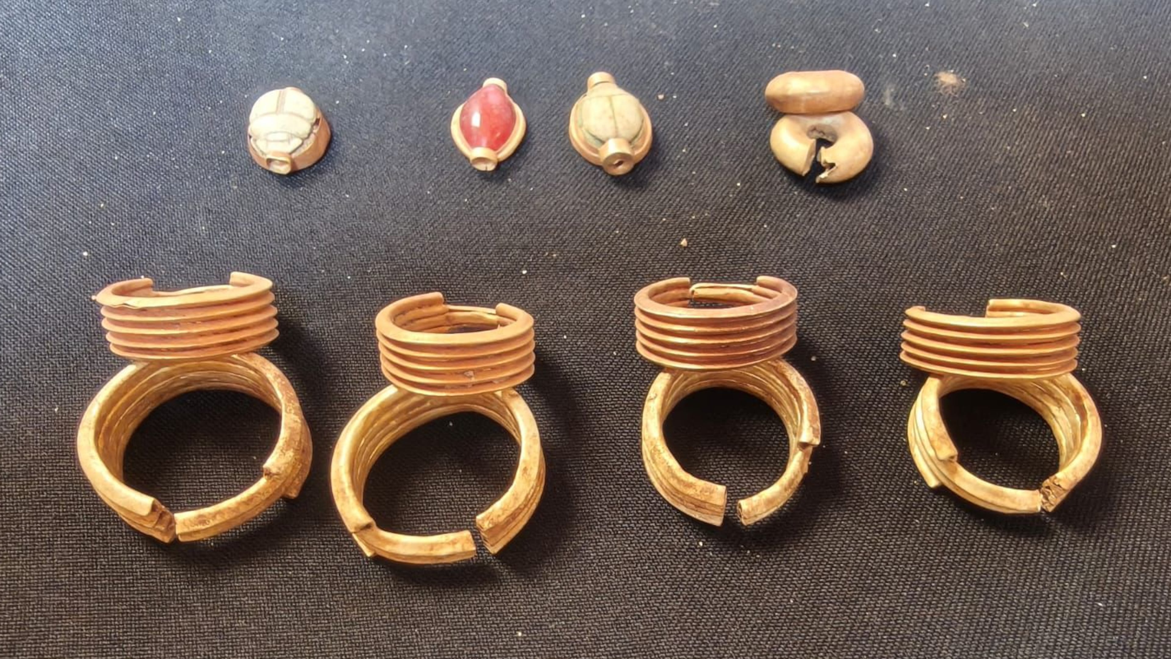 In this photo provided by Ministry of Tourism and Antiquities, recently unearthed ancient artifacts are displayed on May 31, 2026, in Ehnasiya district in Beni Suef, 130 kilometers (80 miles) south of Cairo, Egypt. (Ministry of Tourism and Antiquities via AP)