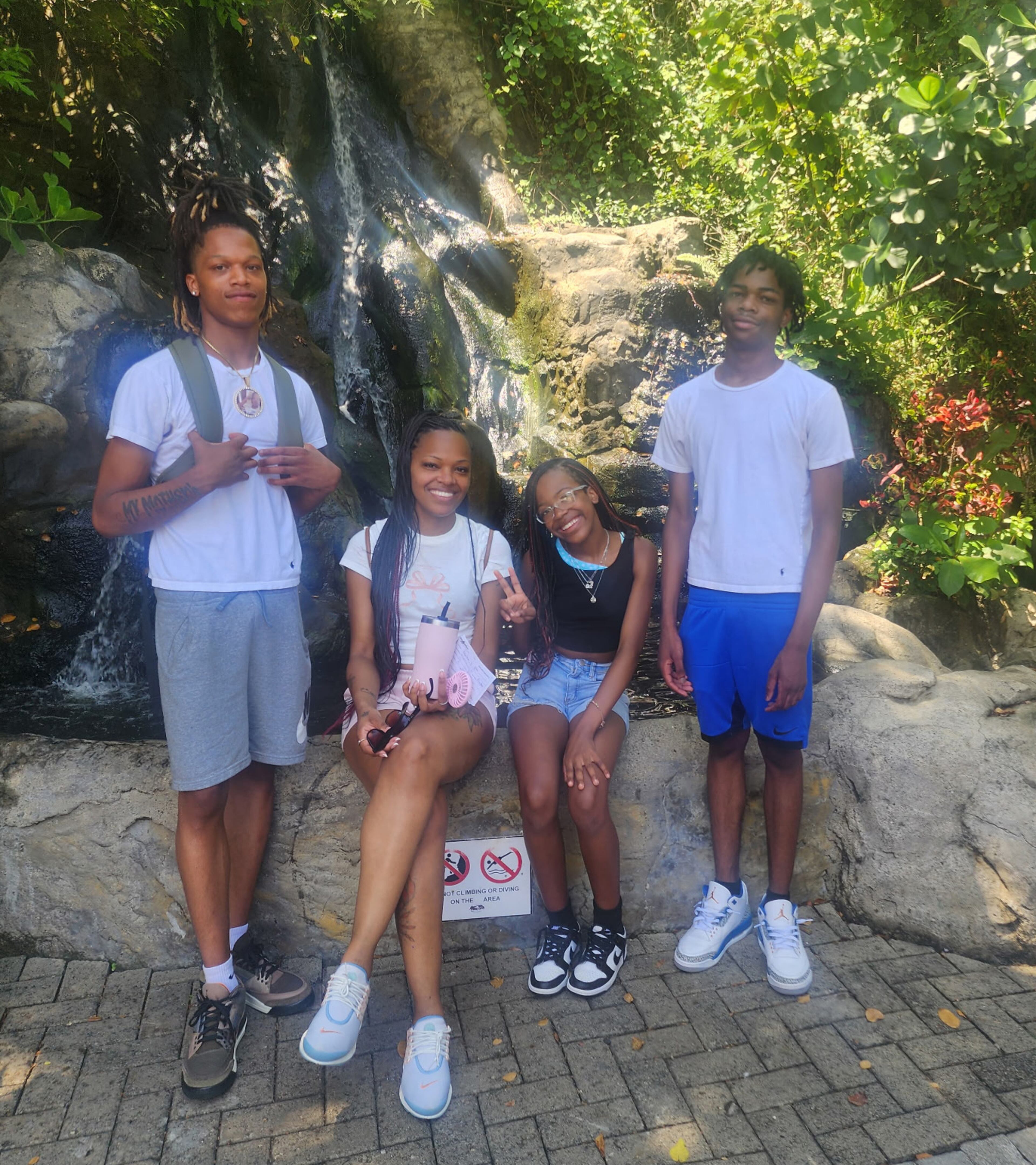 Kennethia McKibben-Gay (second from left) is shown with her three children during a June 2024 trip to the Dominican Republic. (Courtesy of Kennethia McKibben-Gay)