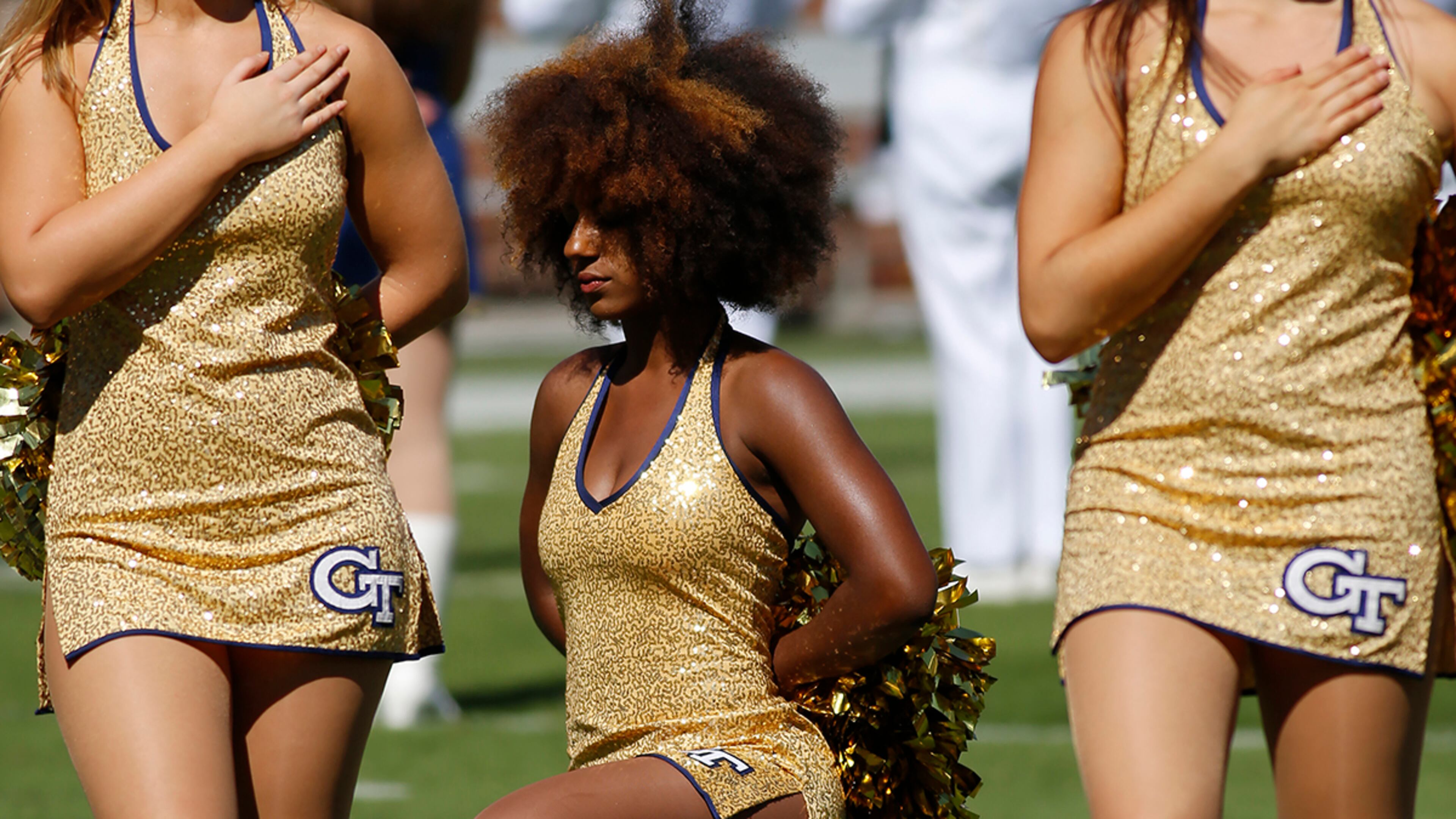Images of Georgia Tech Gold Rush dancer Raianna Brown went viral in 2016 when she knelt during the National Anthem before an Oct. 1, 2016 football game at Bobby Dodd Stadium. (Photo by David J. Griffin/Icon Sportswire) (Icon Sportswire via AP Images)