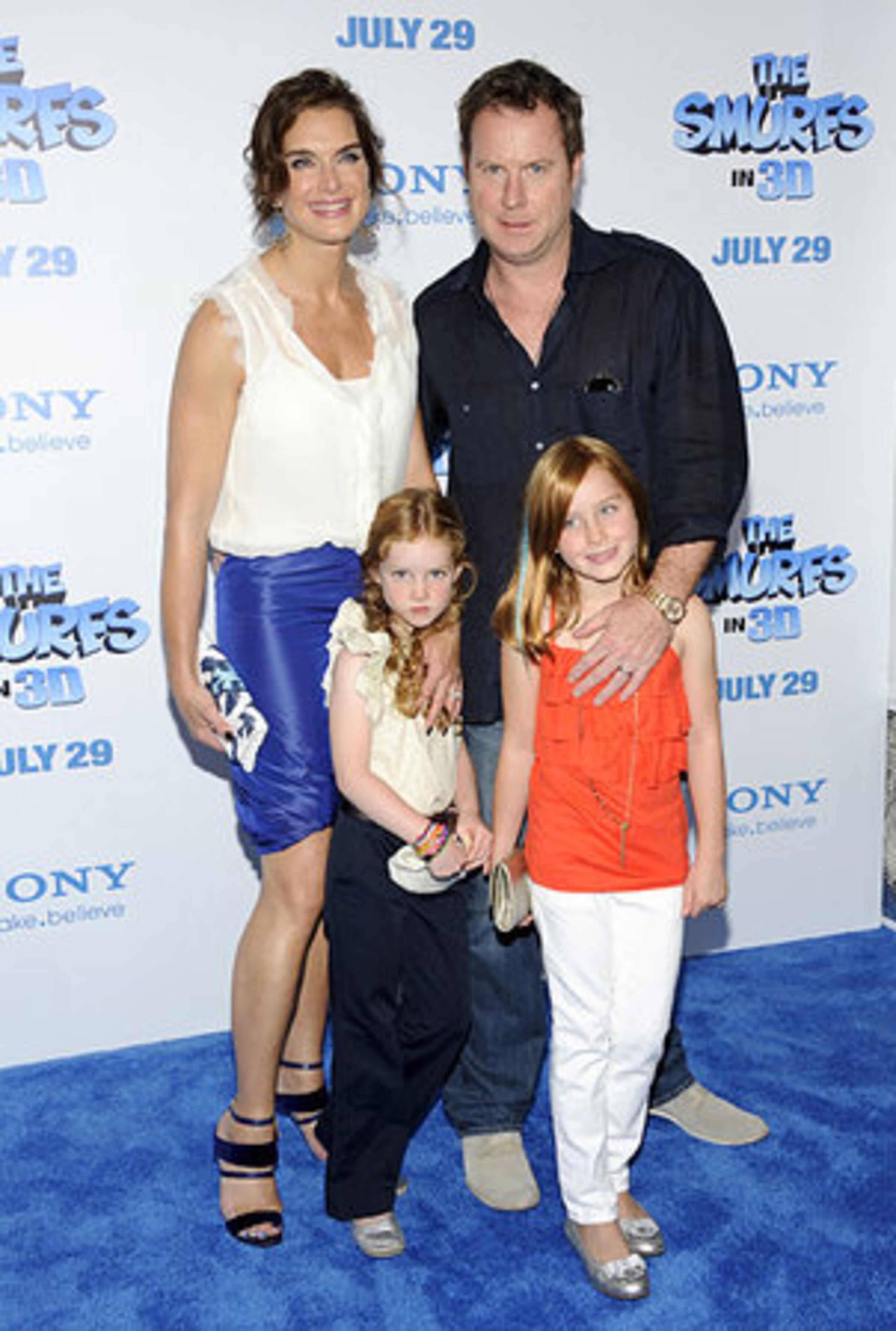 Actress Brooke Shields, left, poses with her husband Chris Henchy and their children at the premiere of "The Smurfs" at the Ziegfeld Theatre on Sunday, July 24, 2011 in New York.