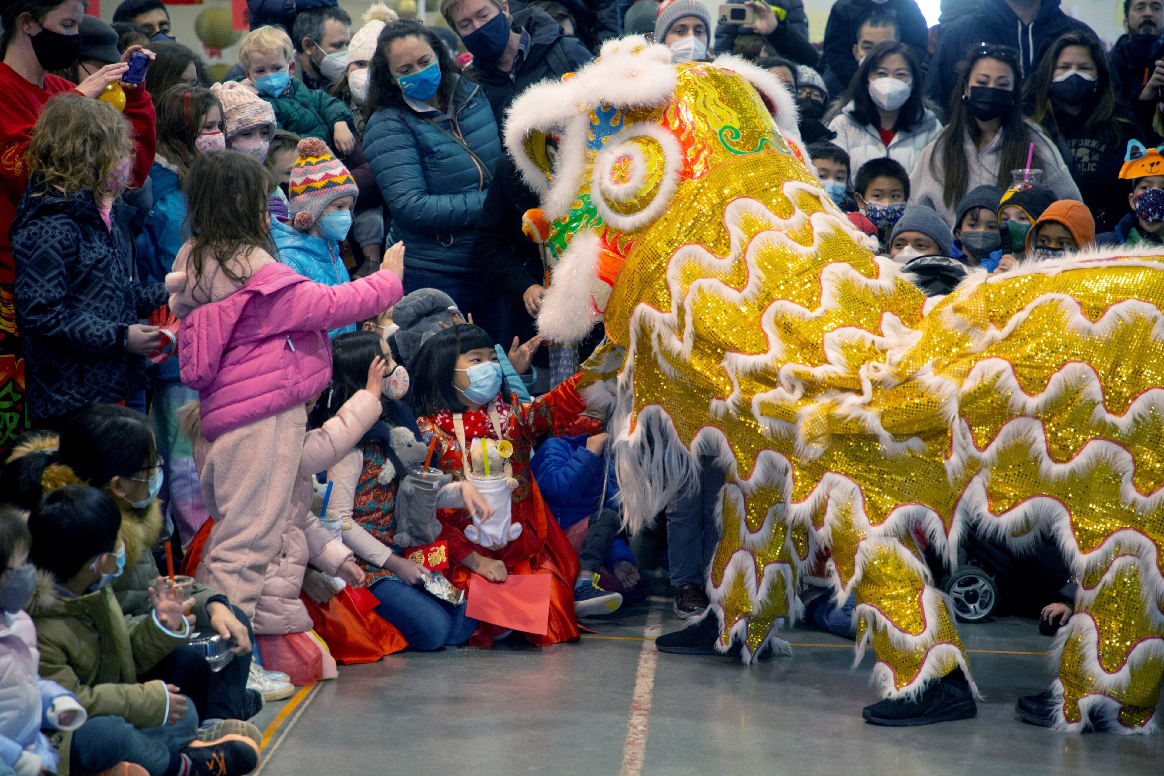 Entertainers perform the Lion Dance during Decatur's first Lunar New Year celebration at Legacy Park on Saturday, January 29, 2022. STEVE SCHAEFER FOR THE ATLANTA JOURNAL-CONSTITUTION