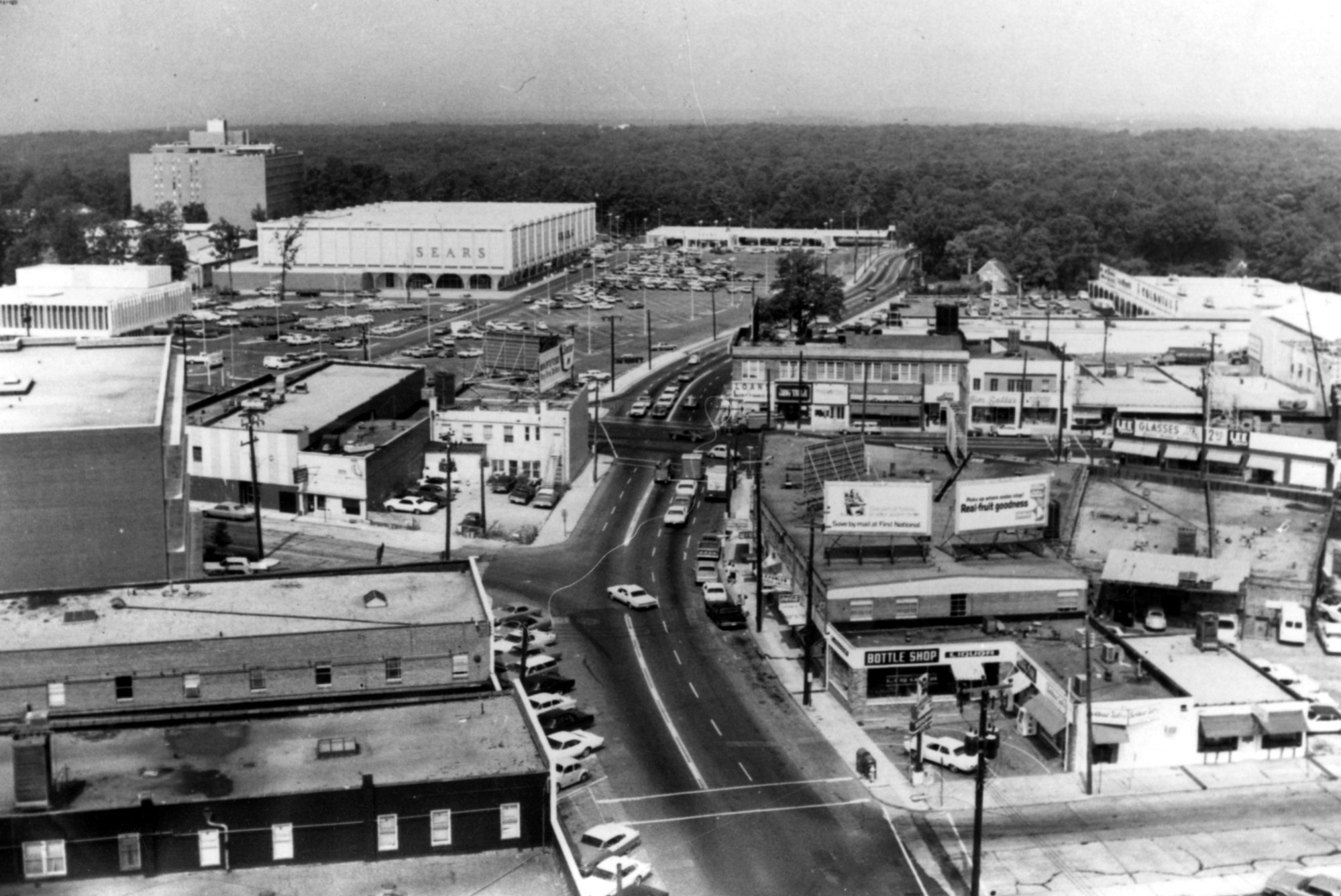 In 1953, the Buckhead Sears store was a landmark. Small businesses and eateries were the mainstay of the neighborhood. East Paces Ferry Road is in the foreground. (Atlanta Historical Society)