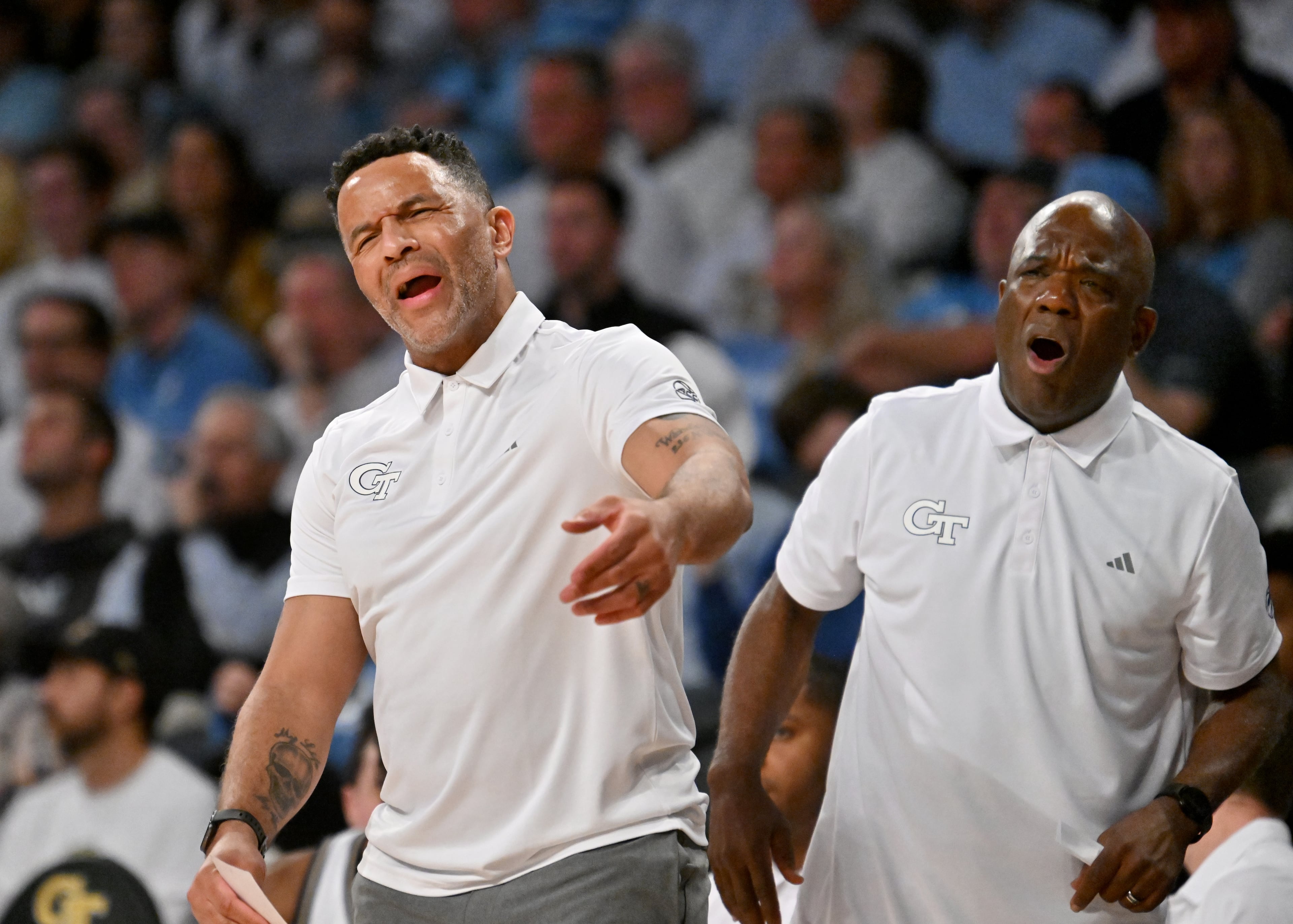 Georgia Tech head coach Damon Stoudamire and associate head coach Karl Hobbs (right) react during the second half of an NCAA college basketball game at Georgia Tech’s McCamish Pavilion, Tuesday, January 30, 2024, in Atlanta. Georgia Tech won 74-73 over North Carolina. (Hyosub Shin / Hyosub.Shin@ajc.com)