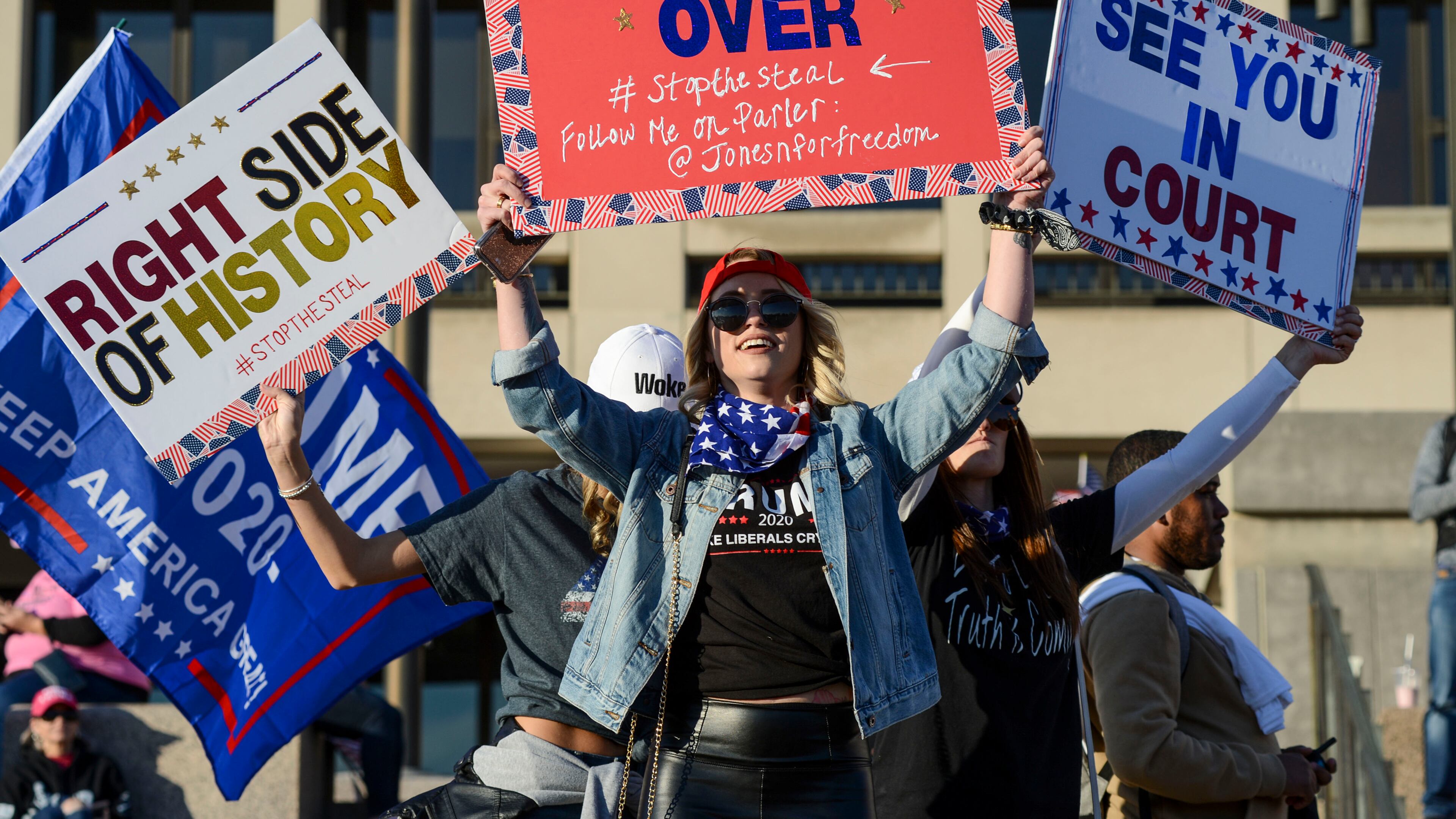 Supporters of President Donald Trump attend a rally near the White House in Washington on Nov. 14 after Amazon, Apple and Google cut off Parler, a social network that pitches itself as a “free speech” alternative to Twitter and Facebook. (Kenny Holston/The New York Times)