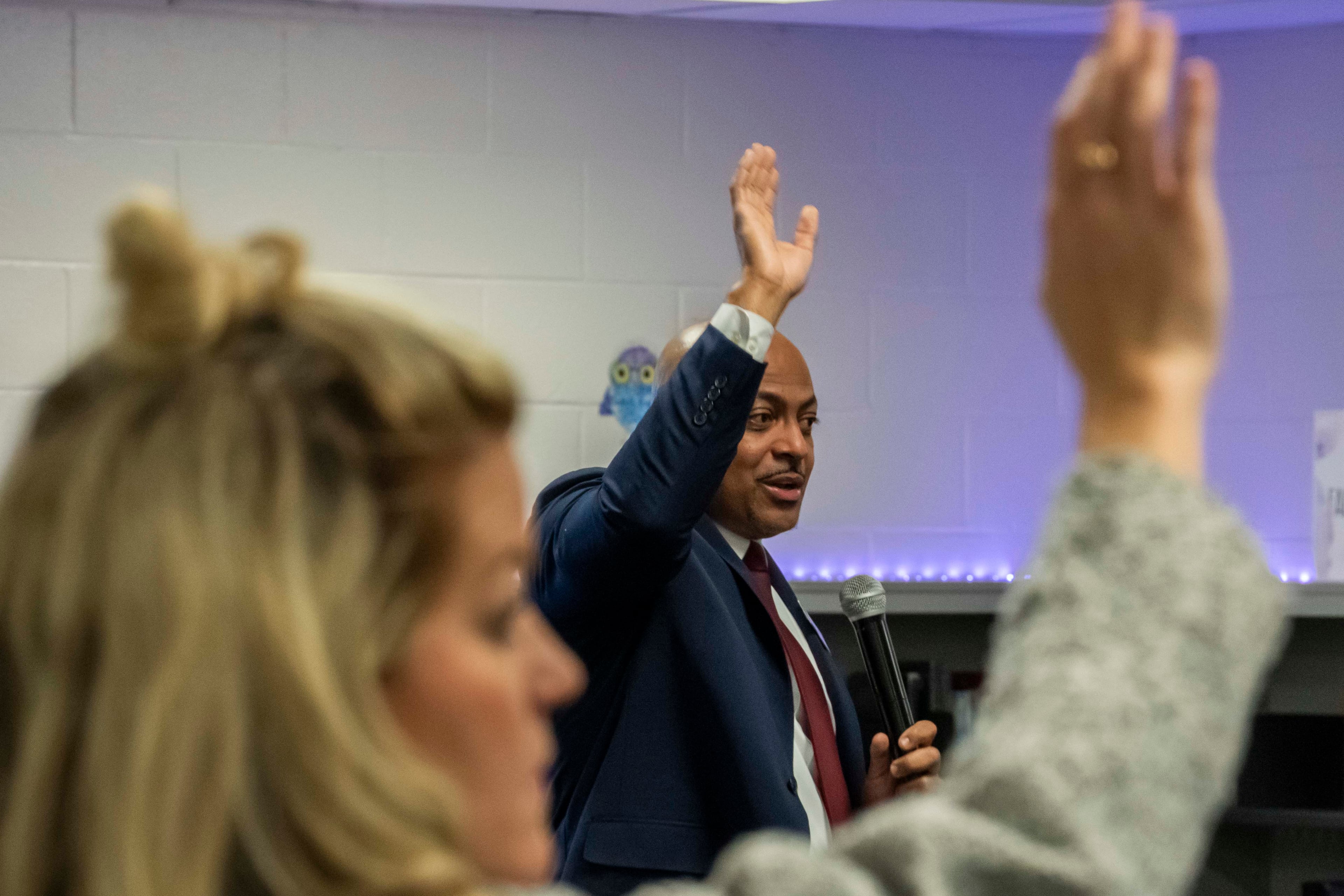 Al Taylor, interim superintendent of Gwinnett County Public Schools, answers questions from parents during a meeting about the school system's decision to enforce redshirting rules. He noted that the decision was partly rooted in funding issues. (Olivia Bowdoin for the AJC)
