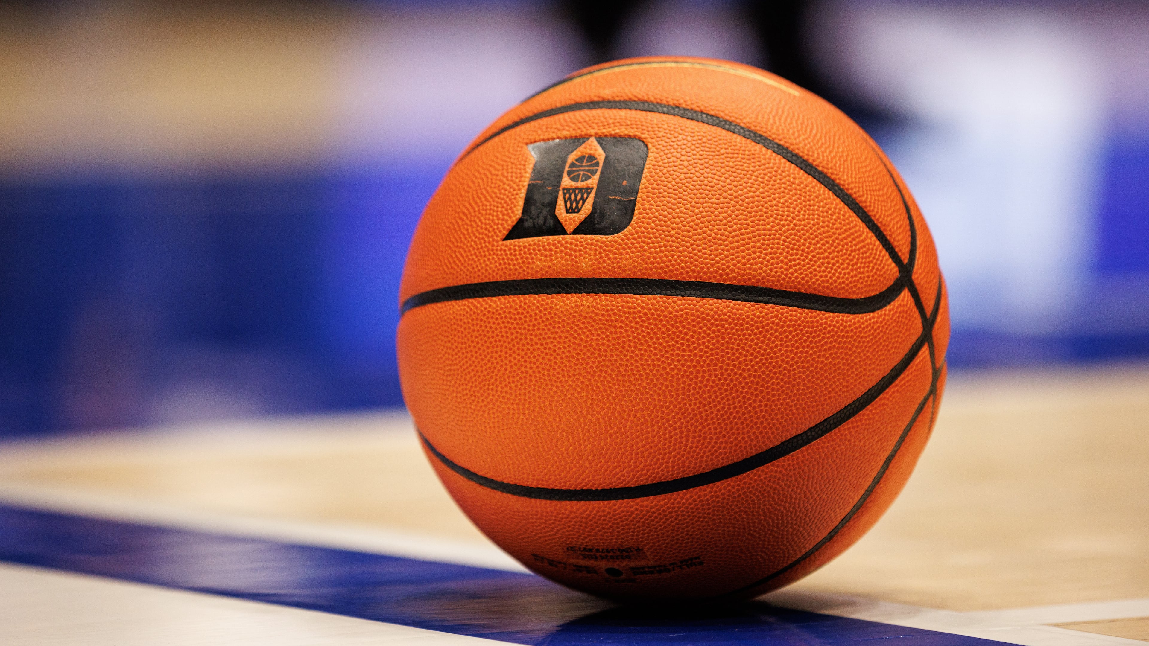 FILE - A basketball with the Duke logo sits on the court during a timeout in an NCAA college basketball game against in Durham, N.C., Dec. 16, 2025. (AP Photo/Ben McKeown, File)