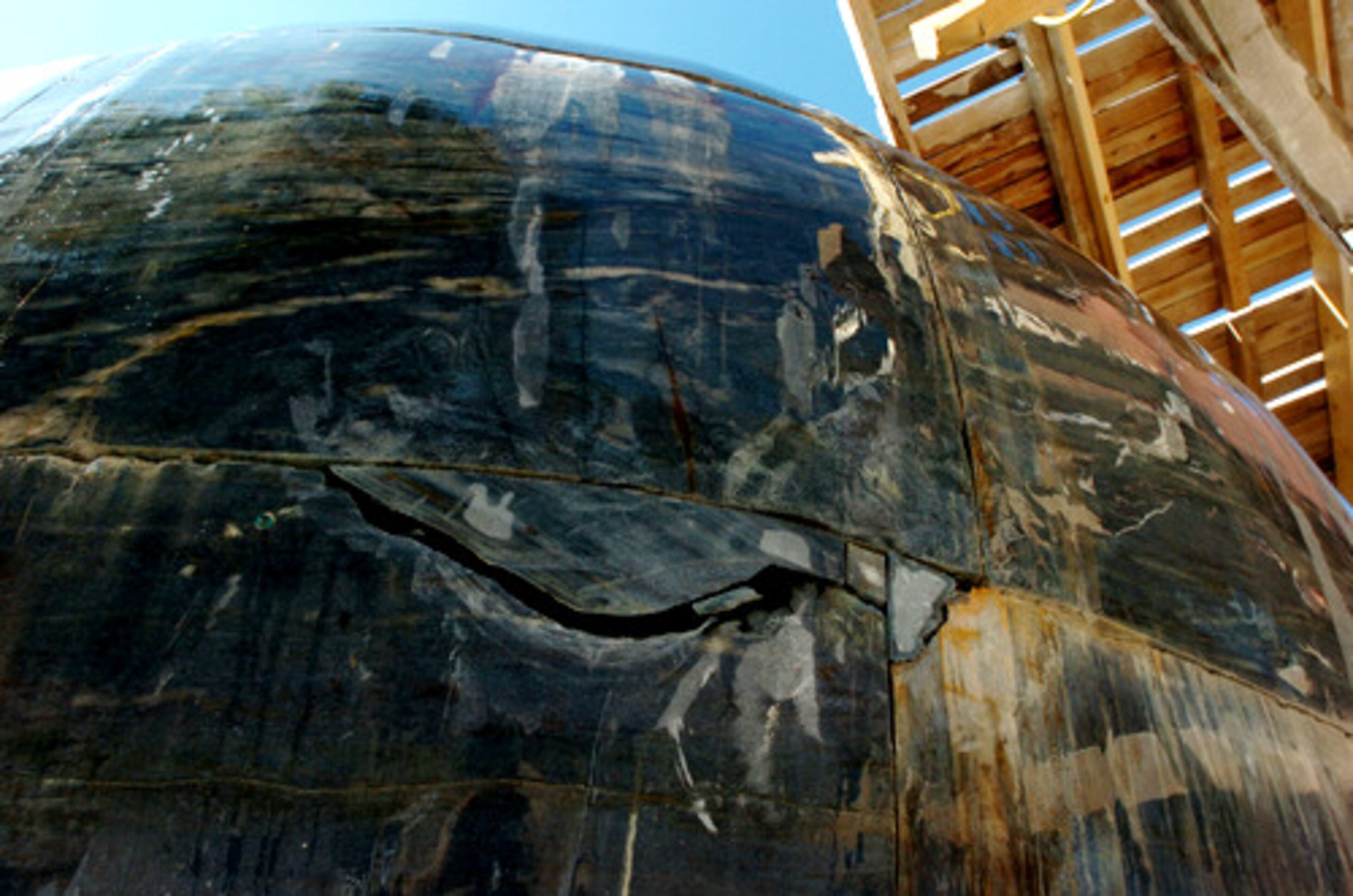 There is a crack, yet to be repaired, in "Spaceship Earth." Eino (pronounced AY-no) , who lives in Nevada, arrived on the KSU campus in late June. He spends long days on the site, bringing along a coffeemaker that sits on the sculpture's black granite foundation so he can make his own brew --- half Sumatran, half Bolivian coffee. At the site, he reviews and separates the pieces with the help of an assistant. Many of the rocks have patches of dried adhesive. Some are chipped at the edges.