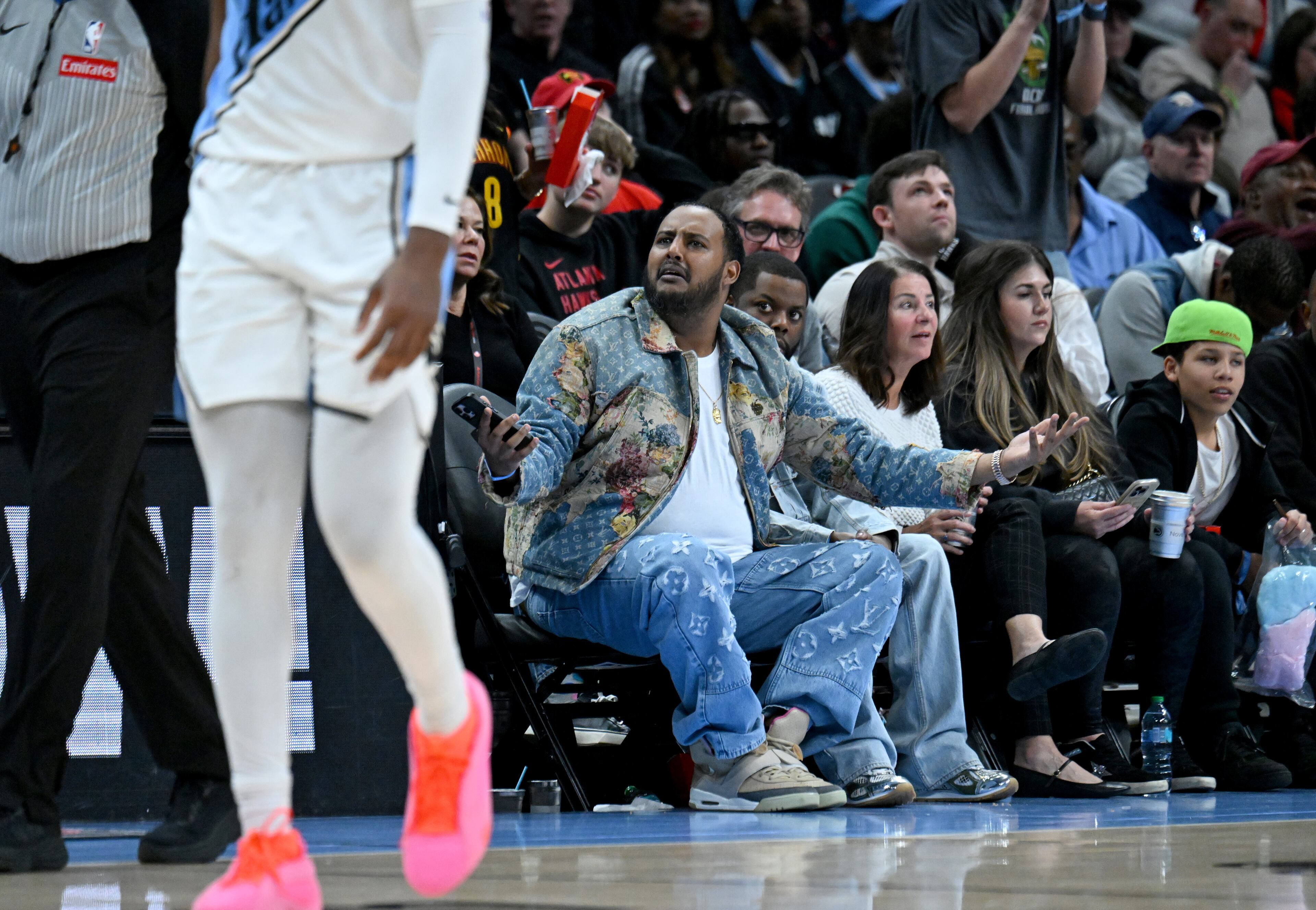 Atlanta Hawks fan reacts to a call during the second half in an NBA basketball game at State Farm Arena, Friday, February 28, 2025, in Atlanta. Oklahoma City Thunder won 135-119 over Atlanta Hawks. (Hyosub Shin / AJC)