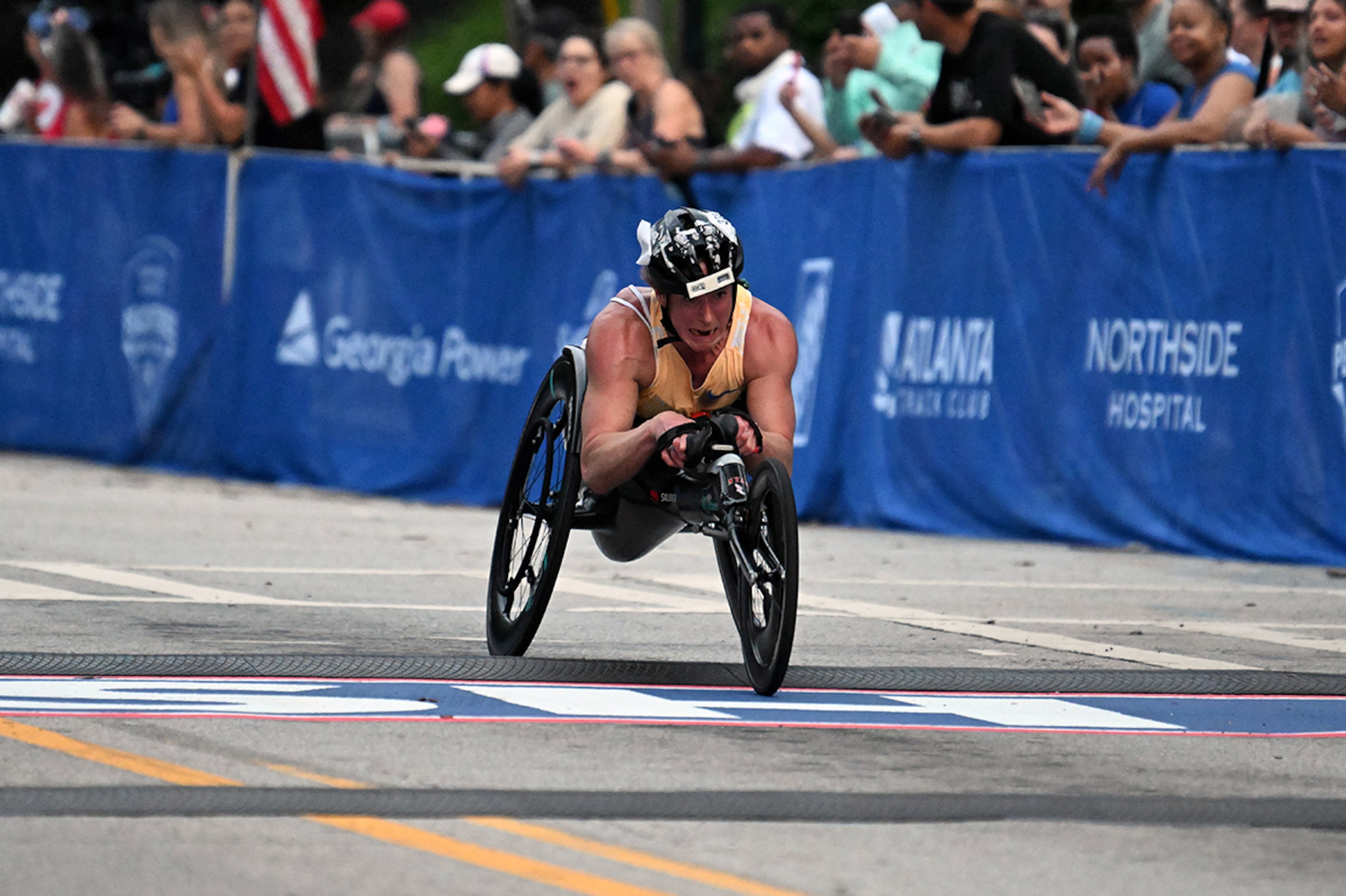 Tatyana McFadden won the 2026 elite women’s Northside Hospital Peachtree Road Race on Saturday July 4, 2026. (Hyosub Shin/AJC)