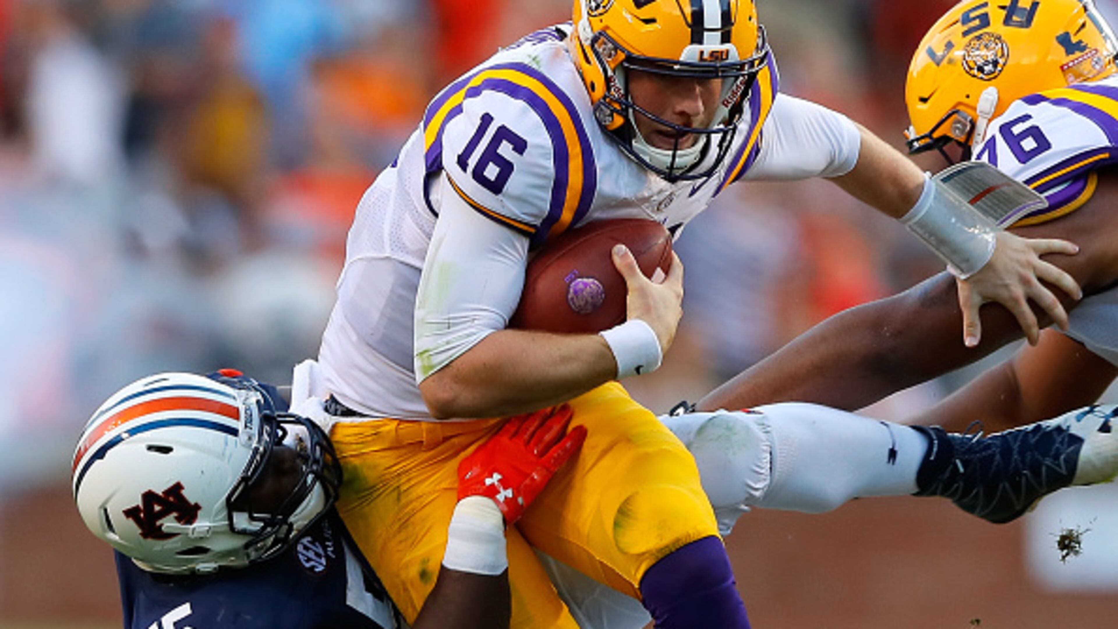AUBURN, AL - SEPTEMBER 24: Carl Lawson #55 of the Auburn Tigers sacks Danny Etling #16 of the LSU Tigers at Jordan-Hare Stadium on September 24, 2016 in Auburn, Alabama. The Milton High product was selected by the Bengals in the fourth round on Saturday. (Photo by Kevin C. Cox/Getty Images)