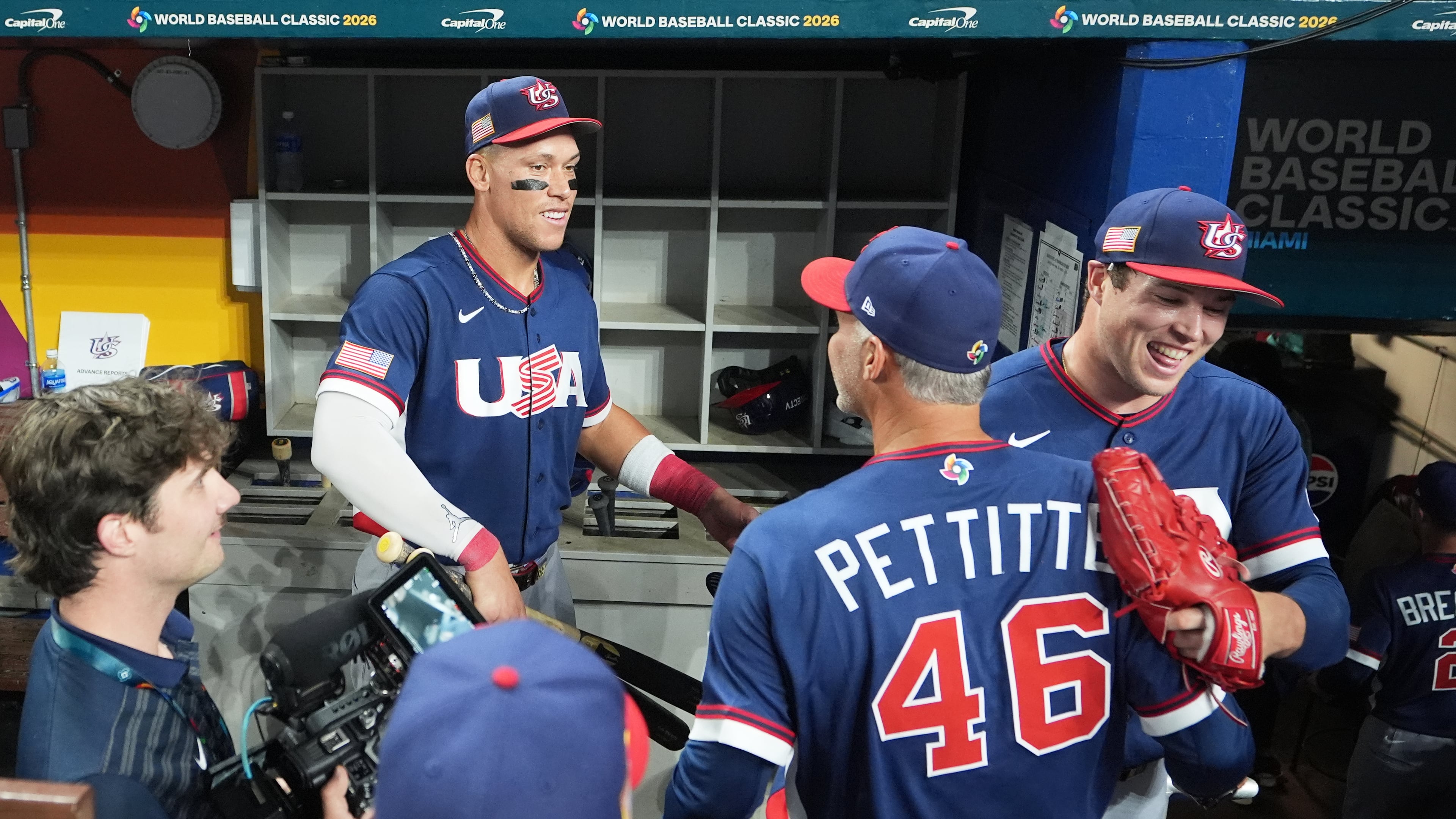 The United States team celebrates after defeating the Dominican Republic at a World Baseball Classic semifinal game, Sunday, March 15, 2026, in Miami. (AP Photo/Lynne Sladky)