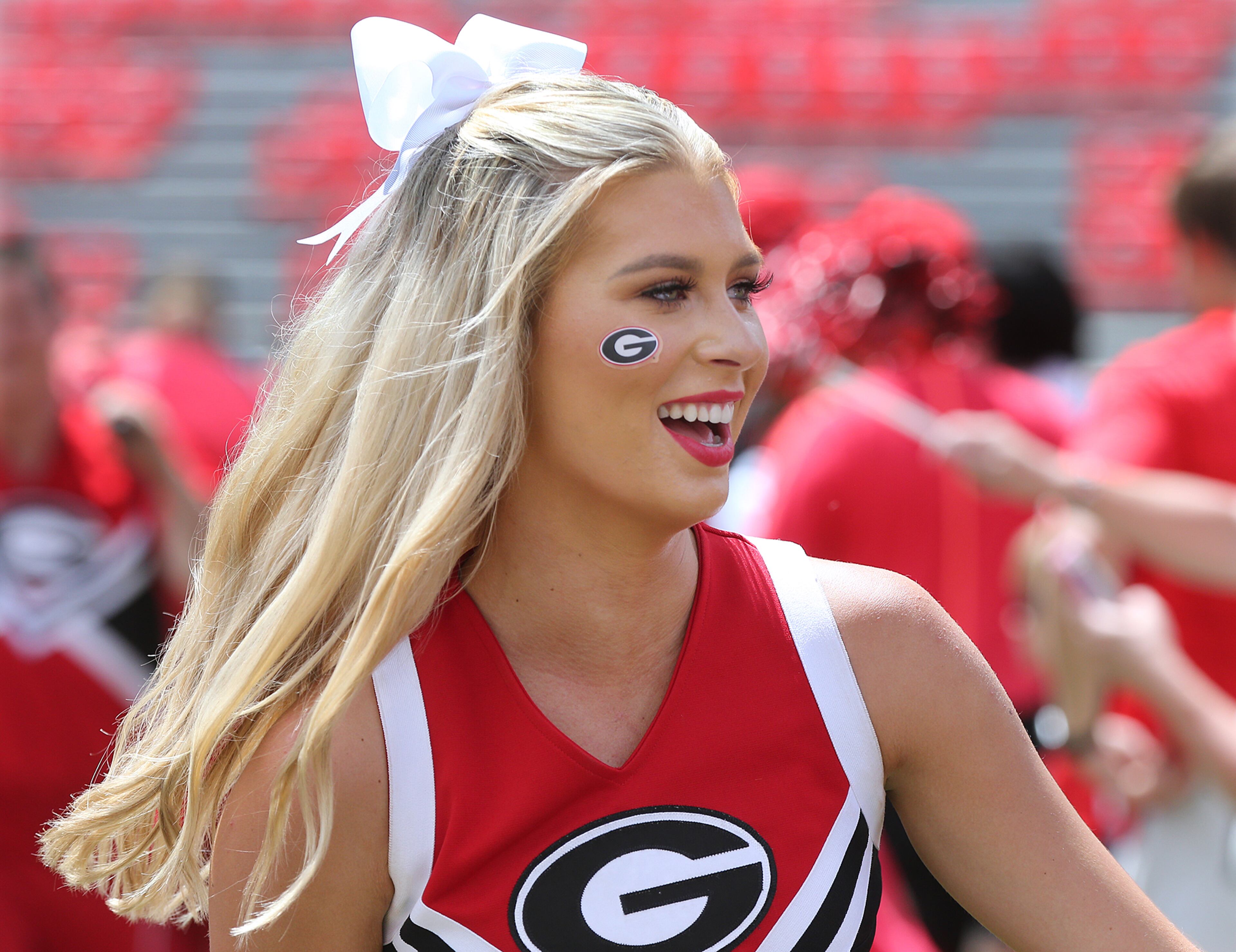 September 1, 2018 Athens: Cheerleaders lead the No. 4 Georgia Bulldogs into Sanford Stadium during the Dawg Walk for the 2018 season opener against Austin Peay in a NCAA college football game on Saturday, Sept 1, 2018, in Athens. Curtis Compton/ccompton@ajc.com