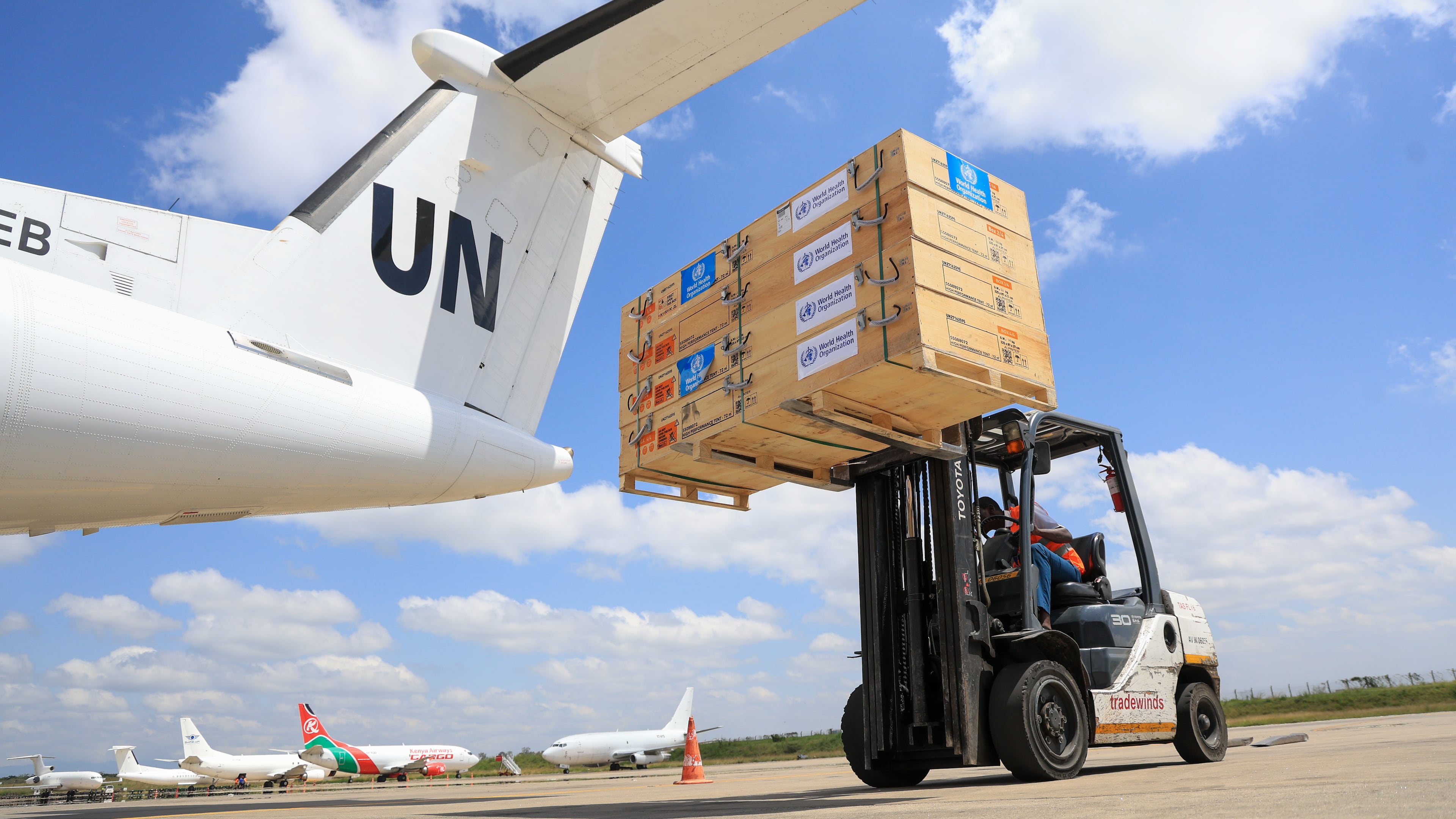 Workers load World Health Organization (WHO) emergency supplies onto a United Nations plane in Nairobi, Kenya, Wednesday, May 20, 2026, headed for Congo to combat the Ebola outbreak in Ituri province. (AP Photo/Andrew Kasuku)