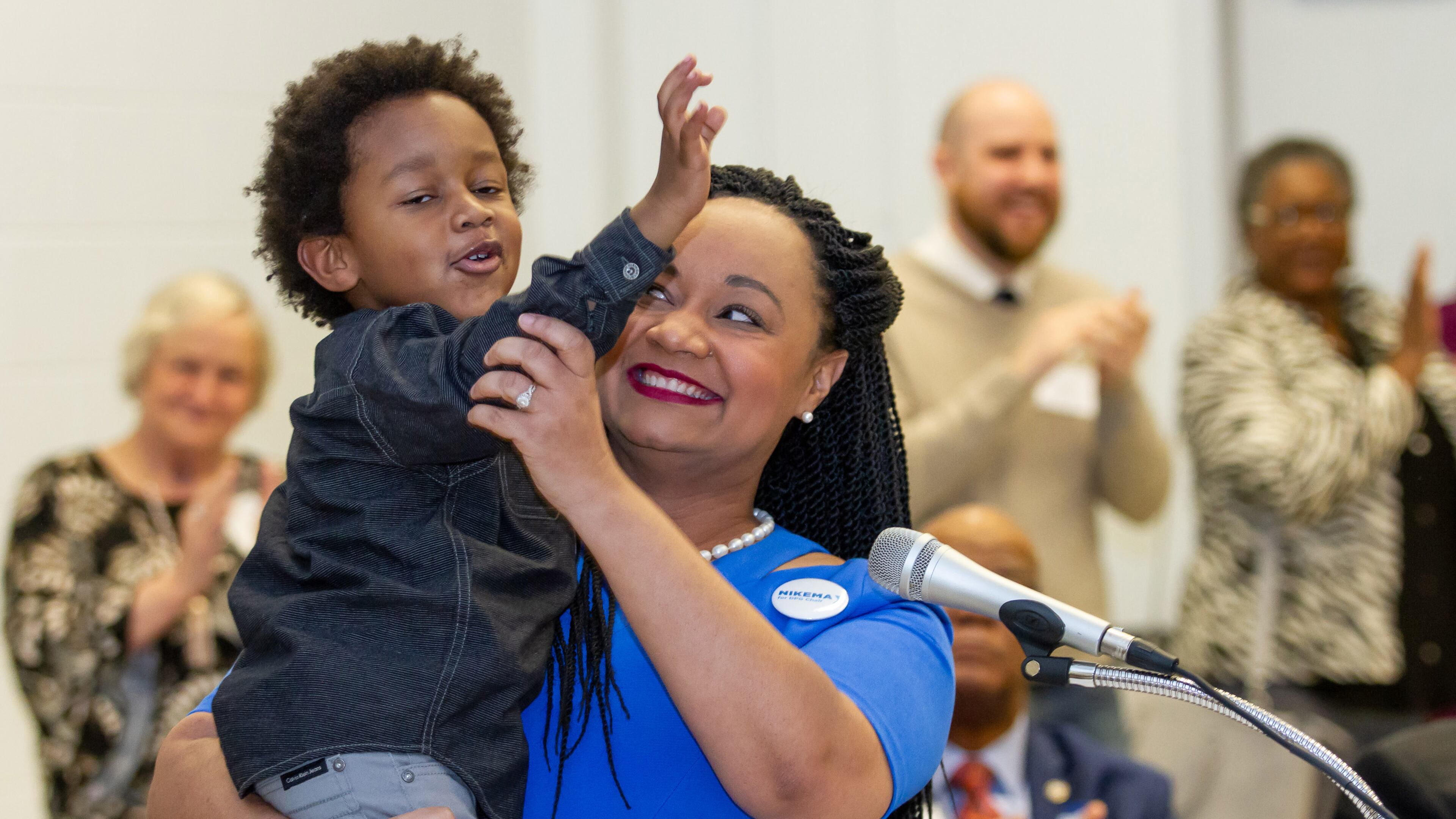 Georgia state Sen. Nikema Williams holds her son Carter Small after Williams at the state convention. STEVE SCHAEFER / SPECIAL TO THE AJC