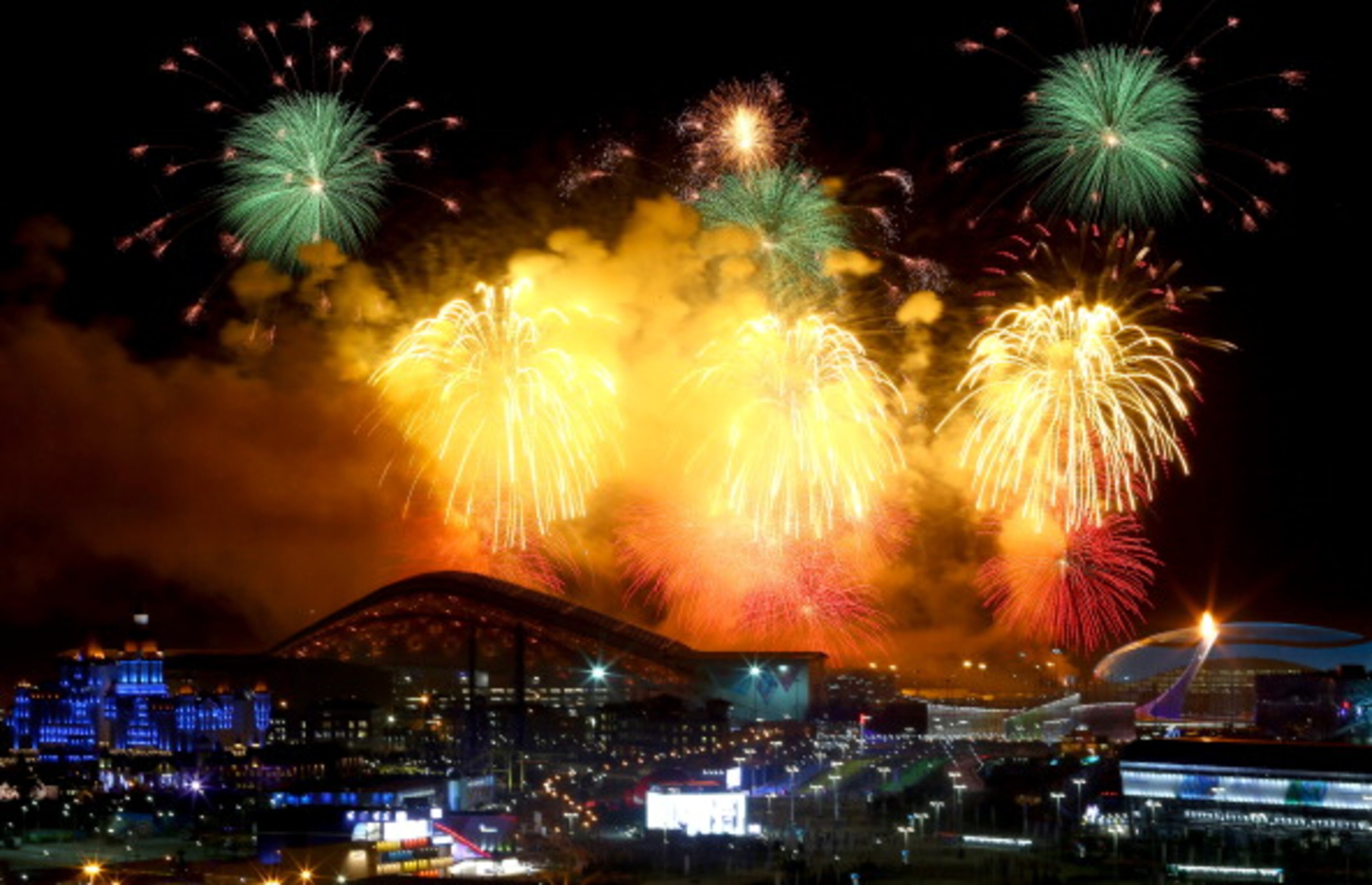 SOCHI, RUSSIA - FEBRUARY 07: Fireworks on display over the Olympic Park during the Opening Ceremony of the Sochi 2014 Winter Olympics at Fisht Olympic Stadium on February 7, 2014 in Sochi, Russia. (Photo by Streeter Lecka/Getty Images)