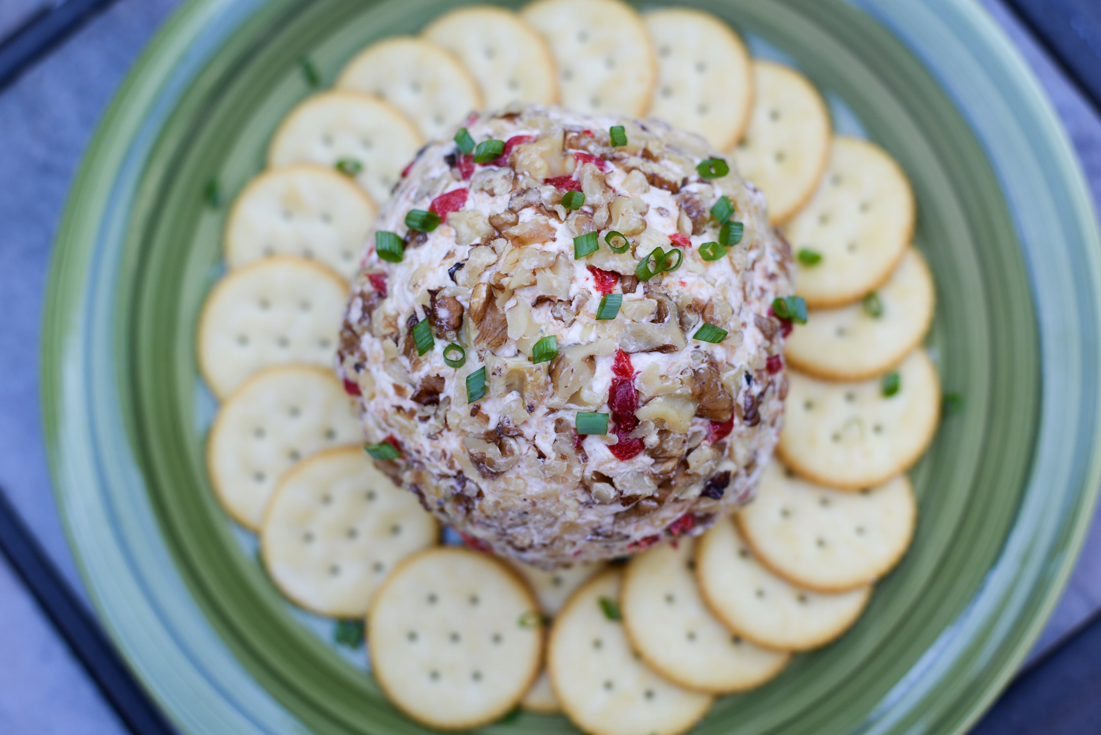 Cheese balls are best served with buttery or neutral-flavored crackers. (Candy Hom for the AJC)