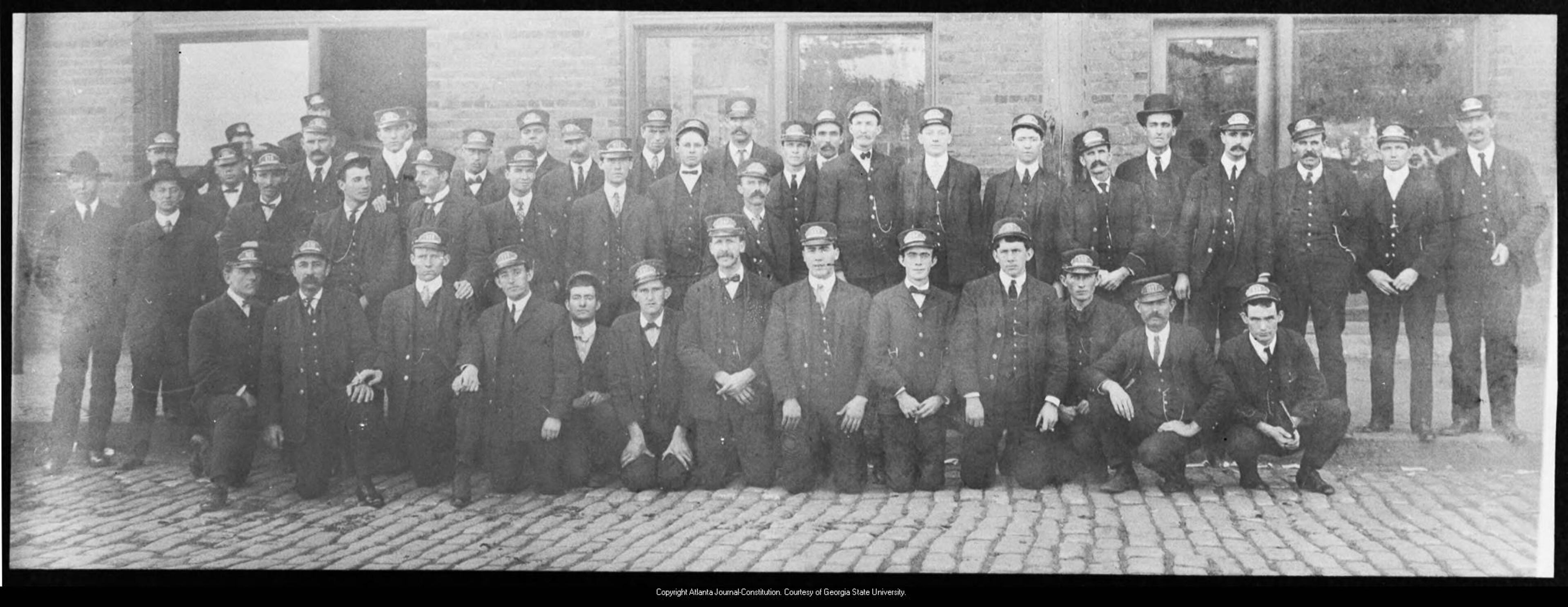 Group portrait of the streetcar conductors of the Georgia Railway and Power Company, Atlanta, Georgia, November 1, 1904. Special Collections and Archives, Georgia State University Library