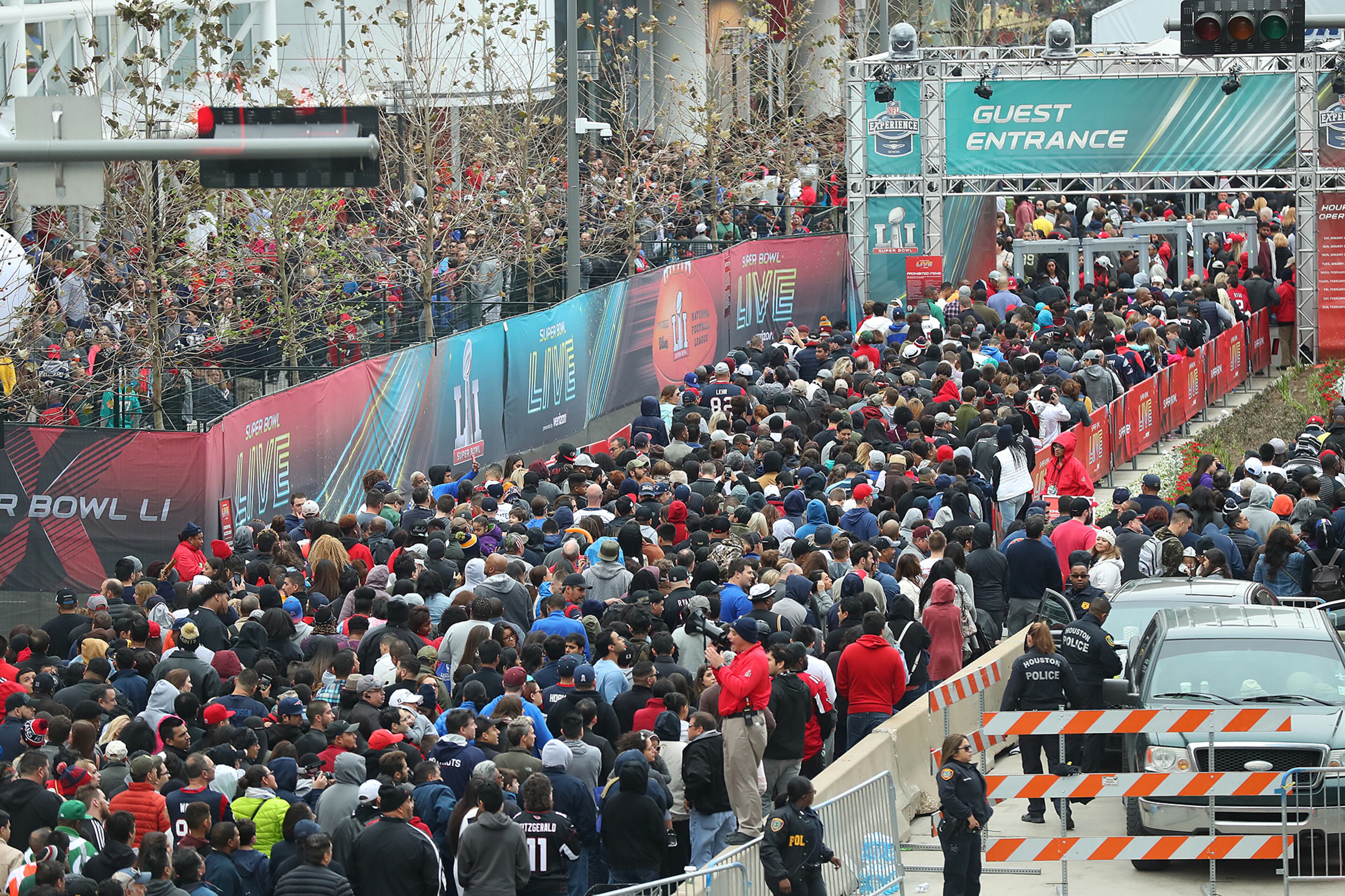 February 4, 2017, Houston: Thousands of fans wait in line to get into the NFL Experience and Super Bowl Live the evening before the Super Bowl on Saturday Feb. 4, 2017, in Houston. Curtis Compton/ccompton@ajc.com