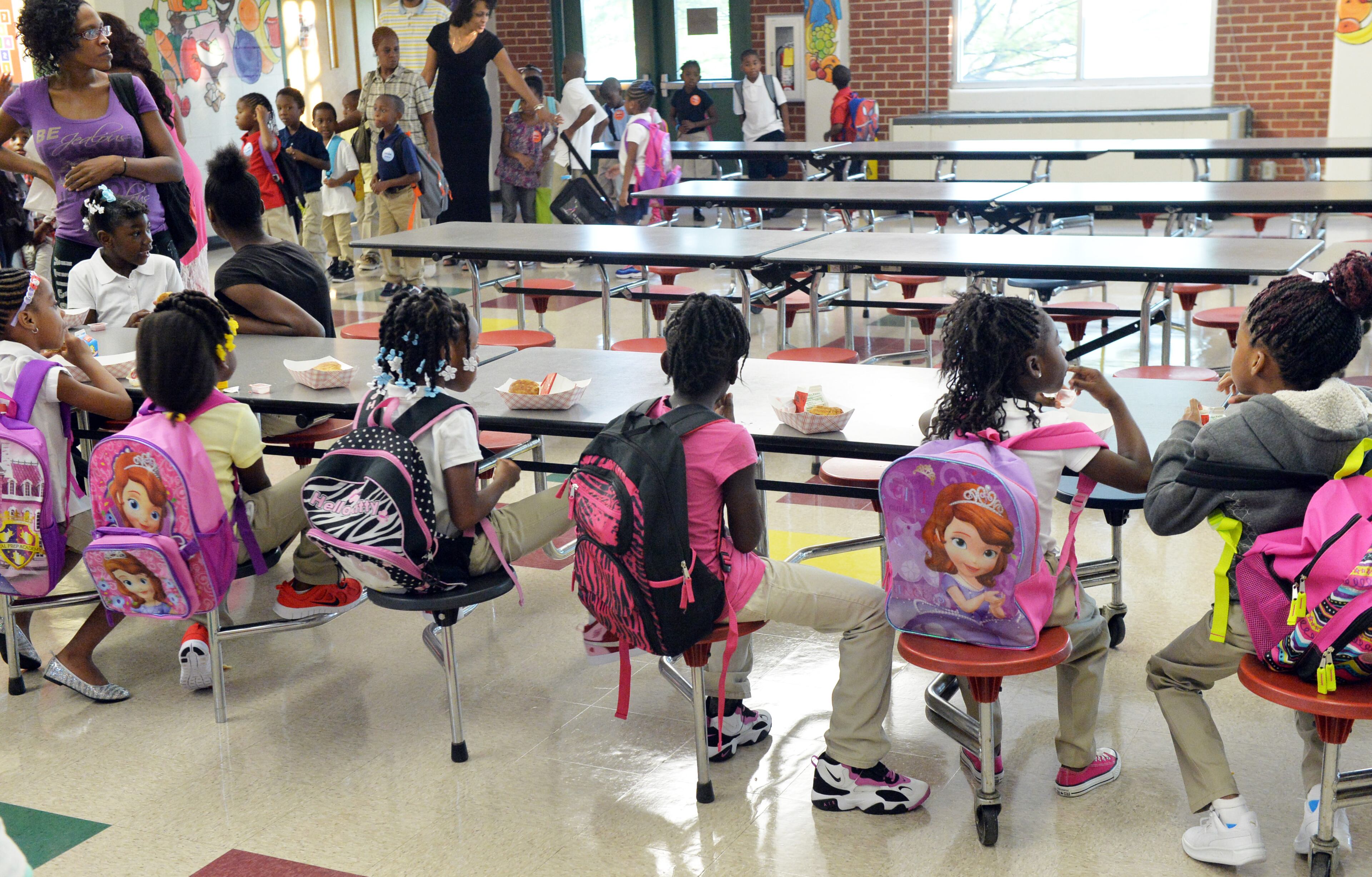 Students eat breakfast as they start back to school at Bethune Elementary School in Atlanta on the first day of classes, Monday August 4, 2014. APS Superintendent Meria Carstarphen greeted students, parents, faculty and staff during the morning. KENT D. JOHNSON/KDJOHNSON@AJC.COM