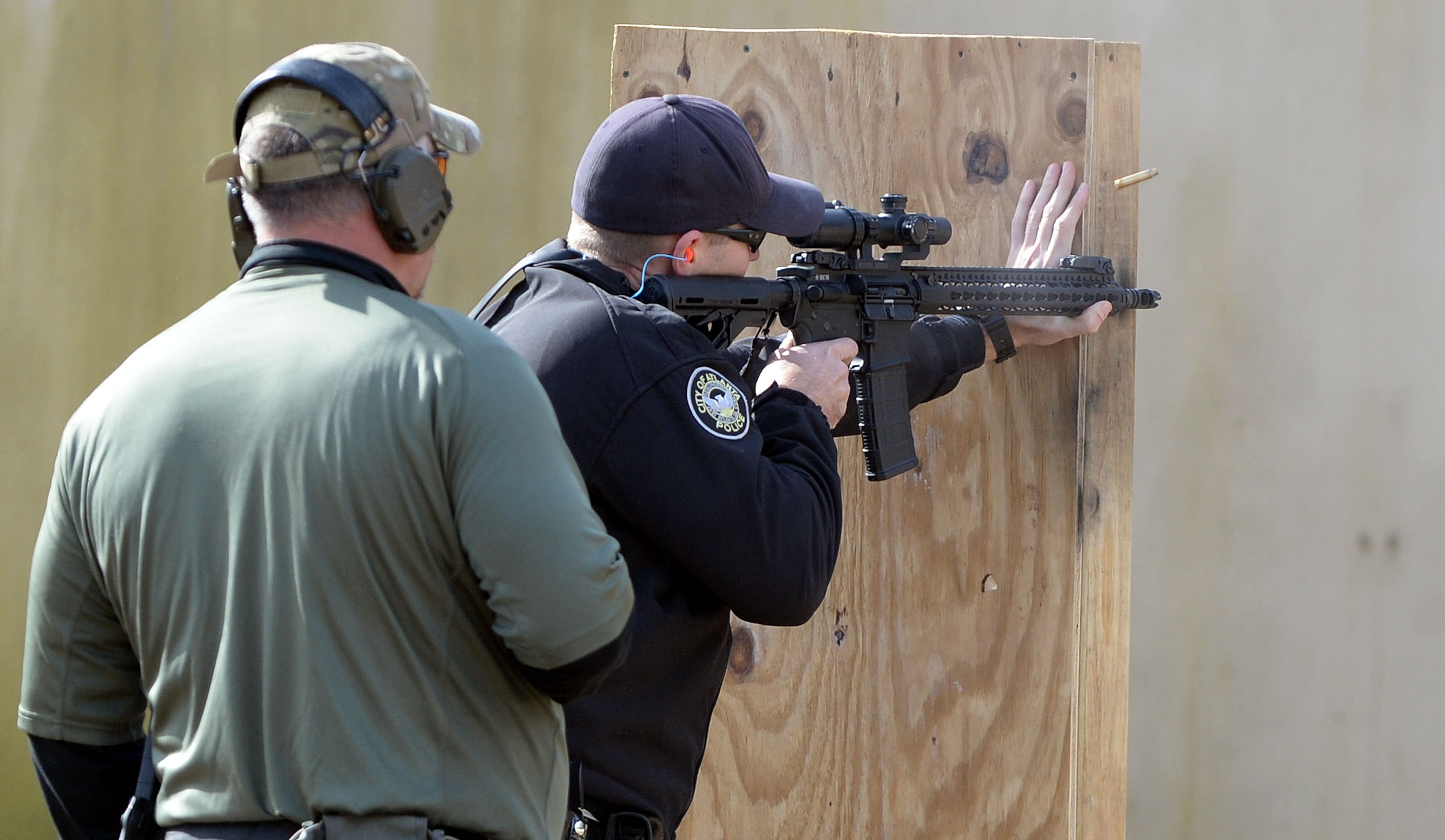 NOVEMBER 24, 2015 ATLANTA APD Officer B. Smith fires downrange during the training. KENT D. JOHNSON/ kdjohnson@ajc.com