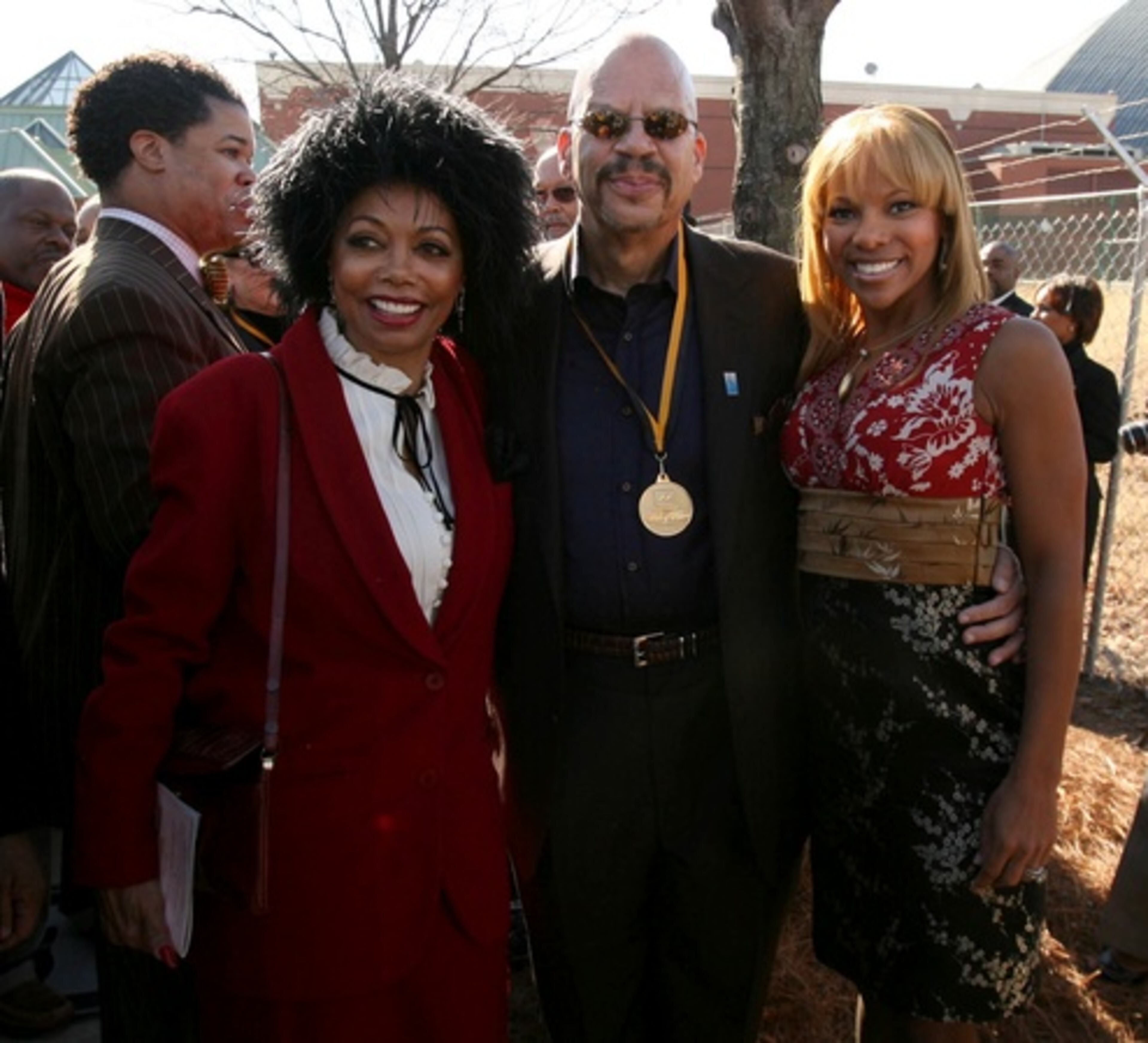 Florence LaRue (from left) of the the 5th Dimension singing group, Tom Joyner, and his wife, Donna Richardson, attend the induction ceremony at Ebenezer Baptist Church.