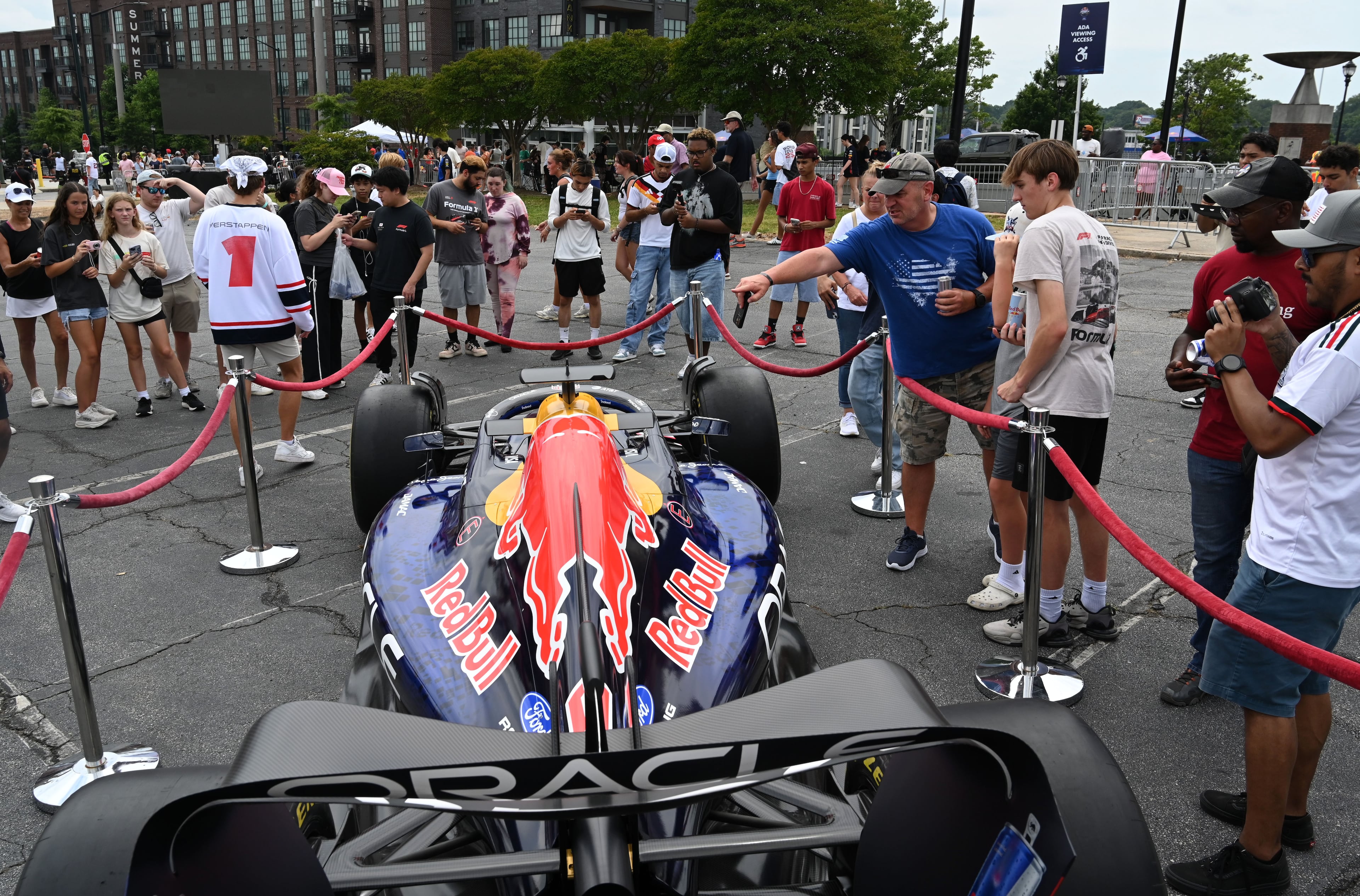 Spectators get a close look at Oracle Red Bull Racing F1 car during Red Bull Showrun Atlanta Presented By Ford Racing on Saturday, August 1, 2026, in Atlanta. Atlanta city officials this week approved permits for the Red Bull Showrun that will allow the live motorsports demonstration event to go on as advertised along a roughly half-mile stretch of Hank Aaron Drive — a backup location after earlier plans to hold the event near Piedmont Park ran into opposition from Midtown residents. (Hyosub Shin/AJC)