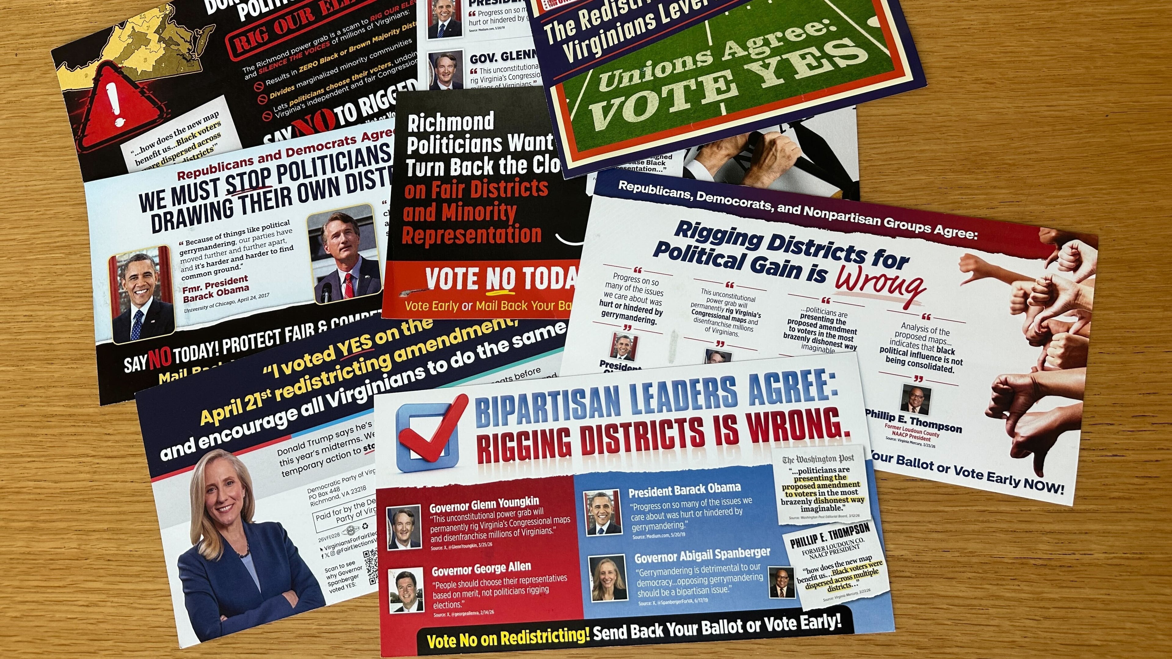 Campaign direct mail advertisements about a Virginia special election on redistricting are on display in Arlington, Va., on April 16, 2026. (AP Photo/Robert Yoon)
