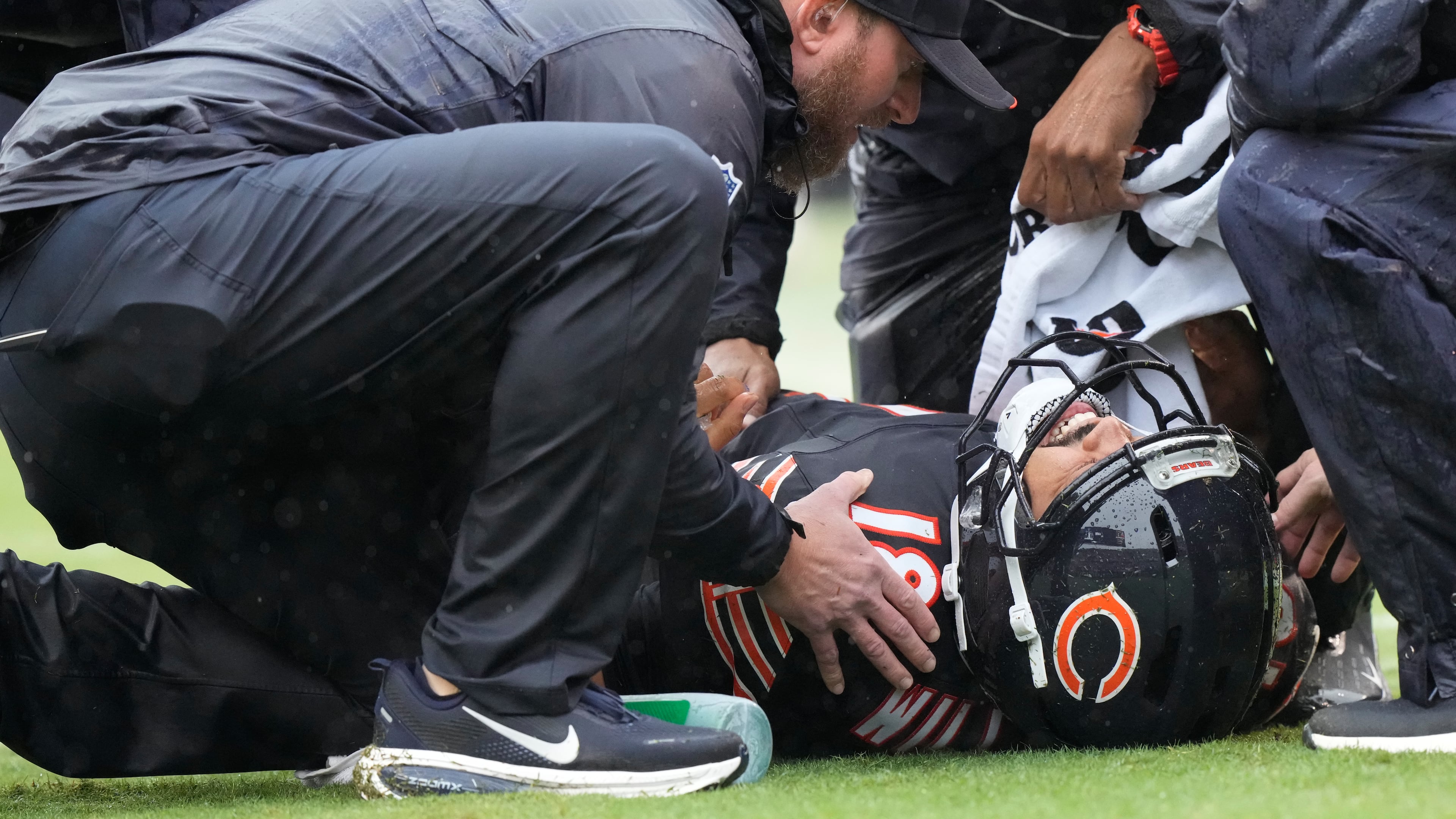 Chicago Bears quarterback Caleb Williams (18) lies on the field during the second half of an NFL football game against the Minnesota Vikings in Chicago, Sunday, Sept. 20, 2026. (AP Photo/Nam Y. Huh)