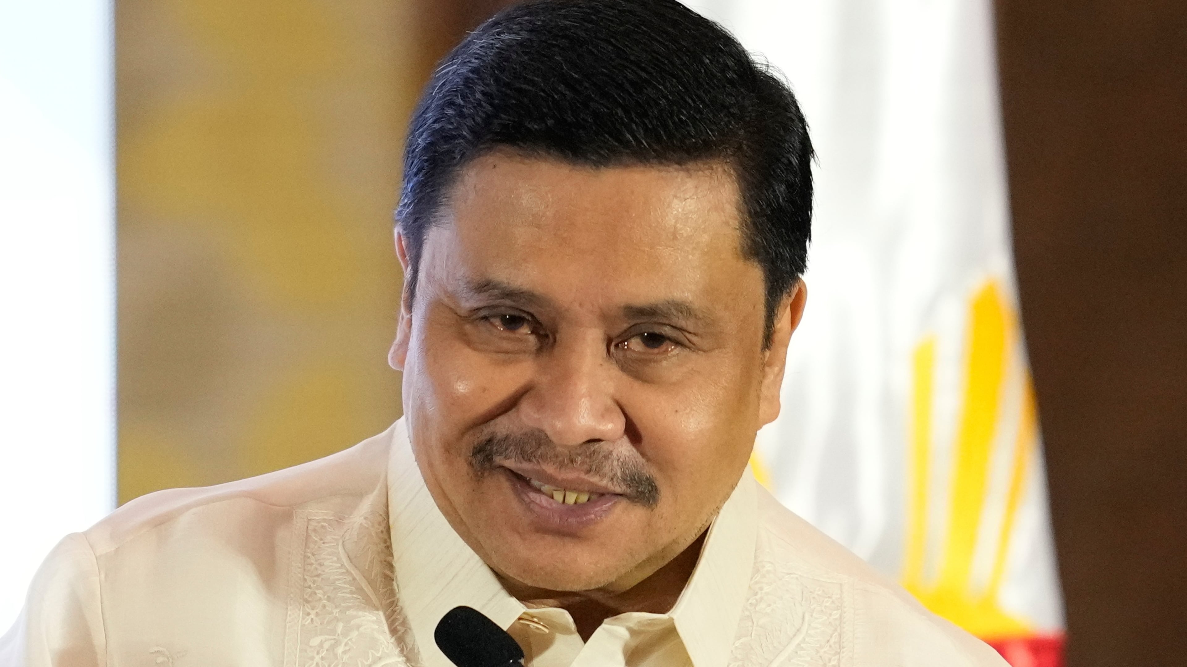 FILE - Senator Jinggoy Estrada speaks on behalf of his father and former Vice President Joseph Estrada during the 90th anniversary of the Office of the Vice President Nov. 14, 2025, at a hotel in Makati, Philippines. (AP Photo/Aaron Favila, File)
