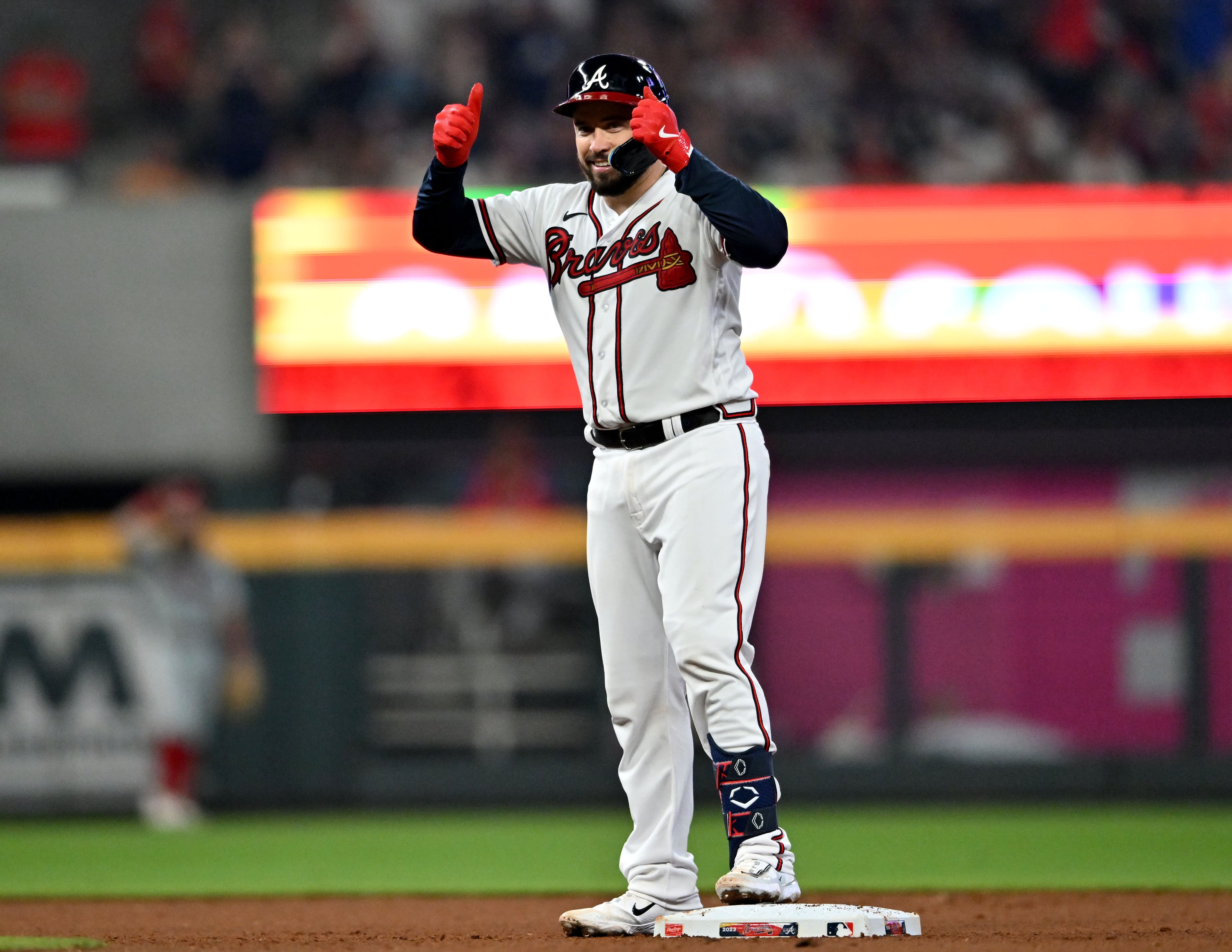Atlanta Braves' catcher Travis d'Arnaud (16) celebrates after hitting a double during the fourth inning at Truist Park, Tuesday, September 19, 2023, in Atlanta. Atlanta Braves won 9-3 over Philadelphia Phillies. (Hyosub Shin / Hyosub.Shin@ajc.com)