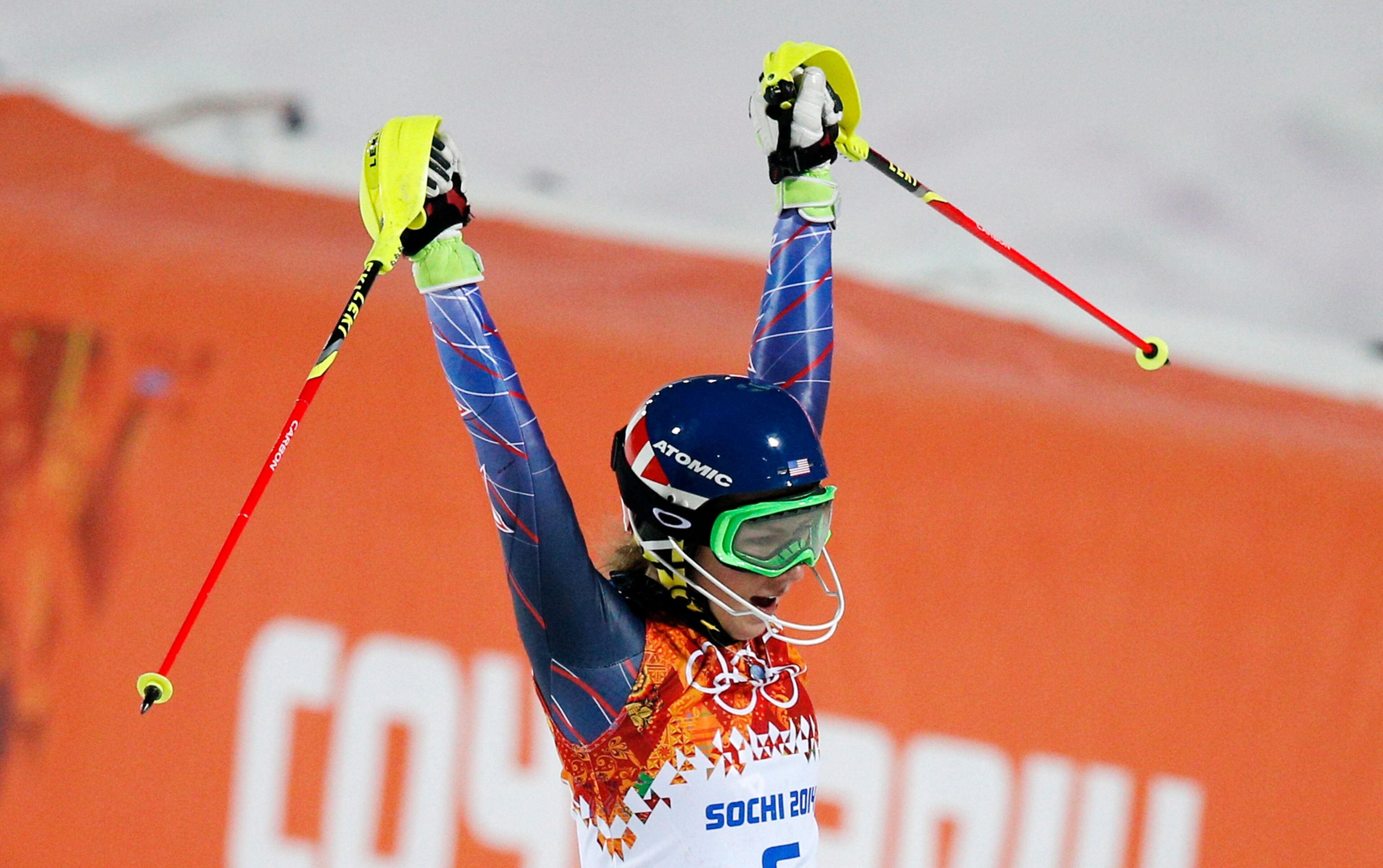 Gold medal winner Mikaela Shiffrin of the United States celebrates as she finishes the second run of the women's slalom at the Sochi 2014 Winter Olympics, Friday, Feb. 21, 2014, in Krasnaya Polyana, Russia.(AP Photo/Christophe Ena)