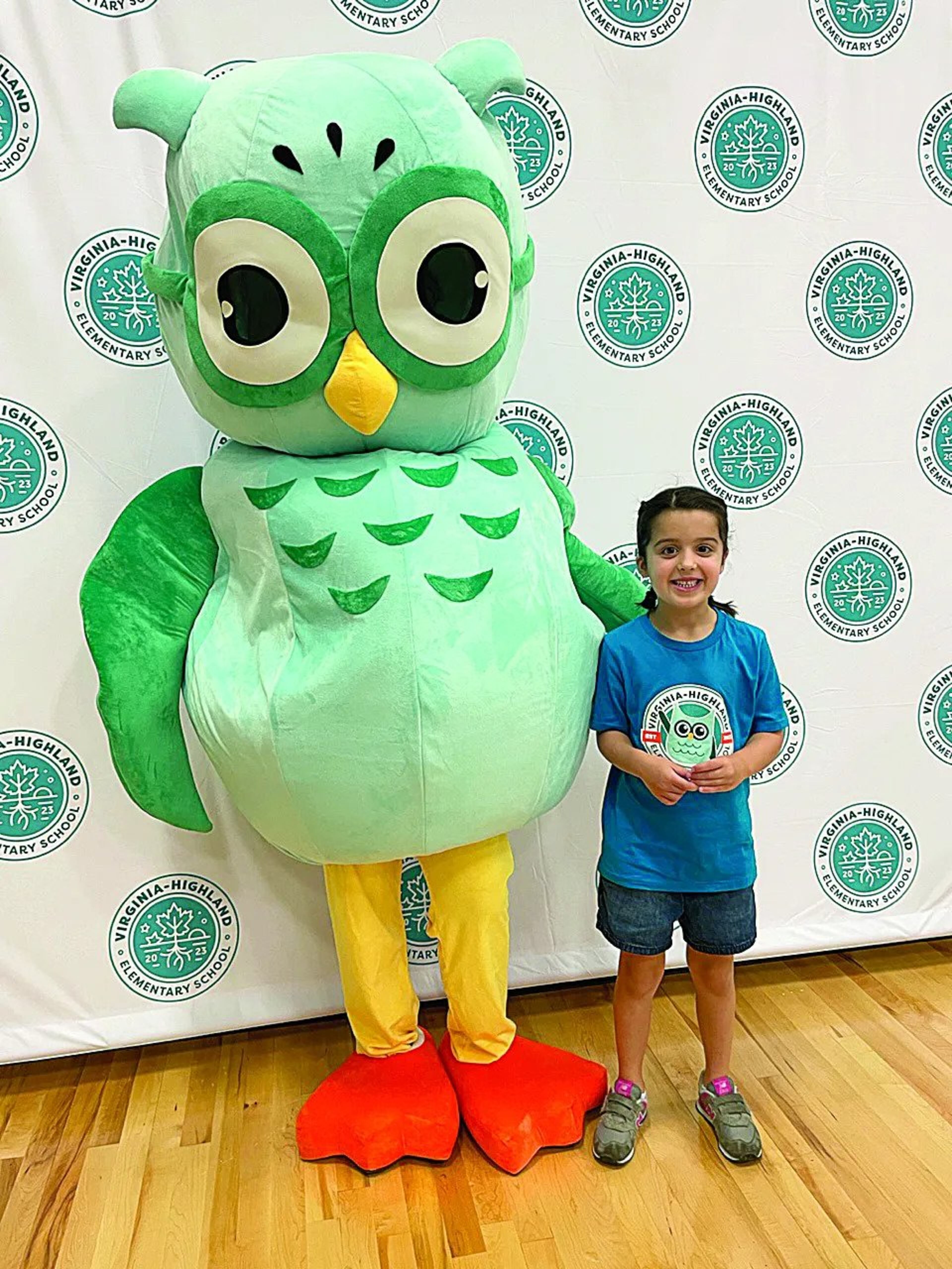 Kindergarten student Kate Valduga with mascot Hootie the Owl. (Photo Courtesy of Ryan Valduga)