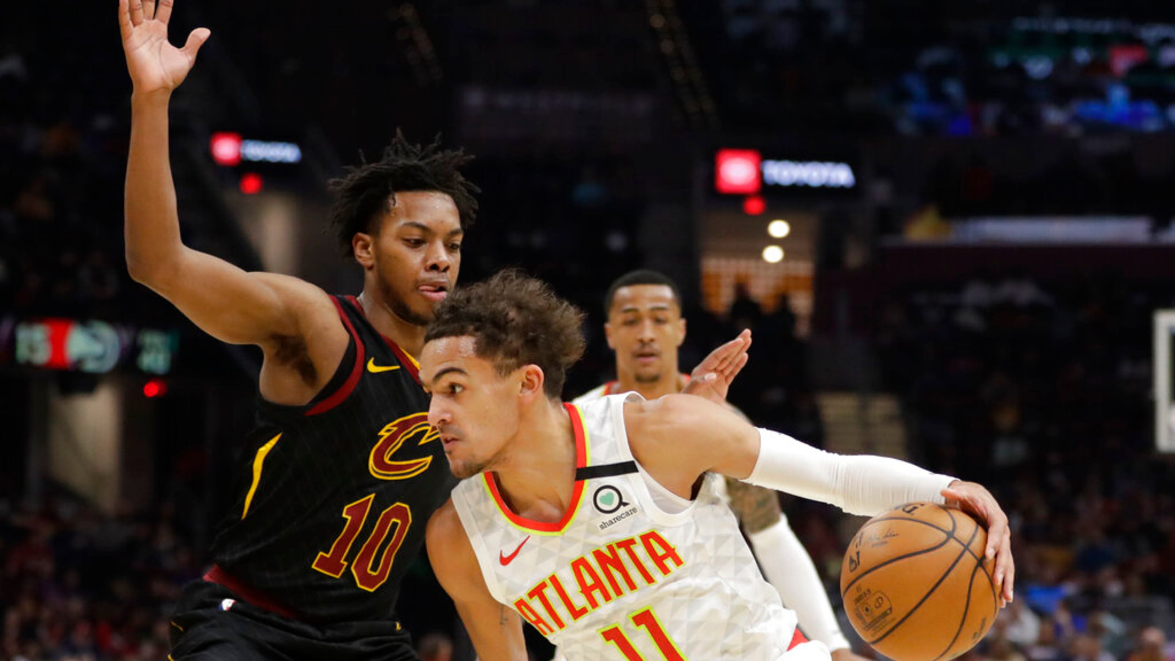 Atlanta Hawks' Trae Young (11) drives past Cleveland Cavaliers' Darius Garland (10) in the second half of an NBA basketball game, Wednesday, Feb. 12, 2020, in Cleveland. The Cavaliers won 127-105. (AP Photo/Tony Dejak)