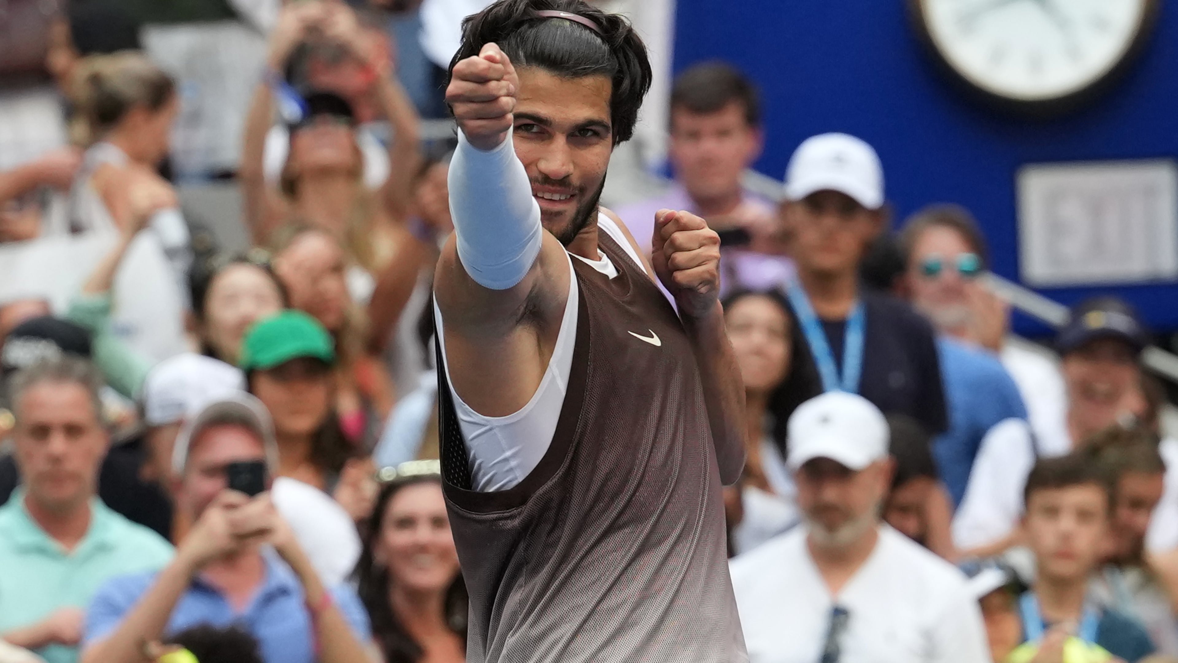 Carlos Alcaraz, of Spain, gestures after he won his match against Wu Yibing, of China, during the third round of the U.S. Open tennis championships Friday, Sept. 4, 2026, in New York. (AP Photo/Kirsty Wigglesworth)