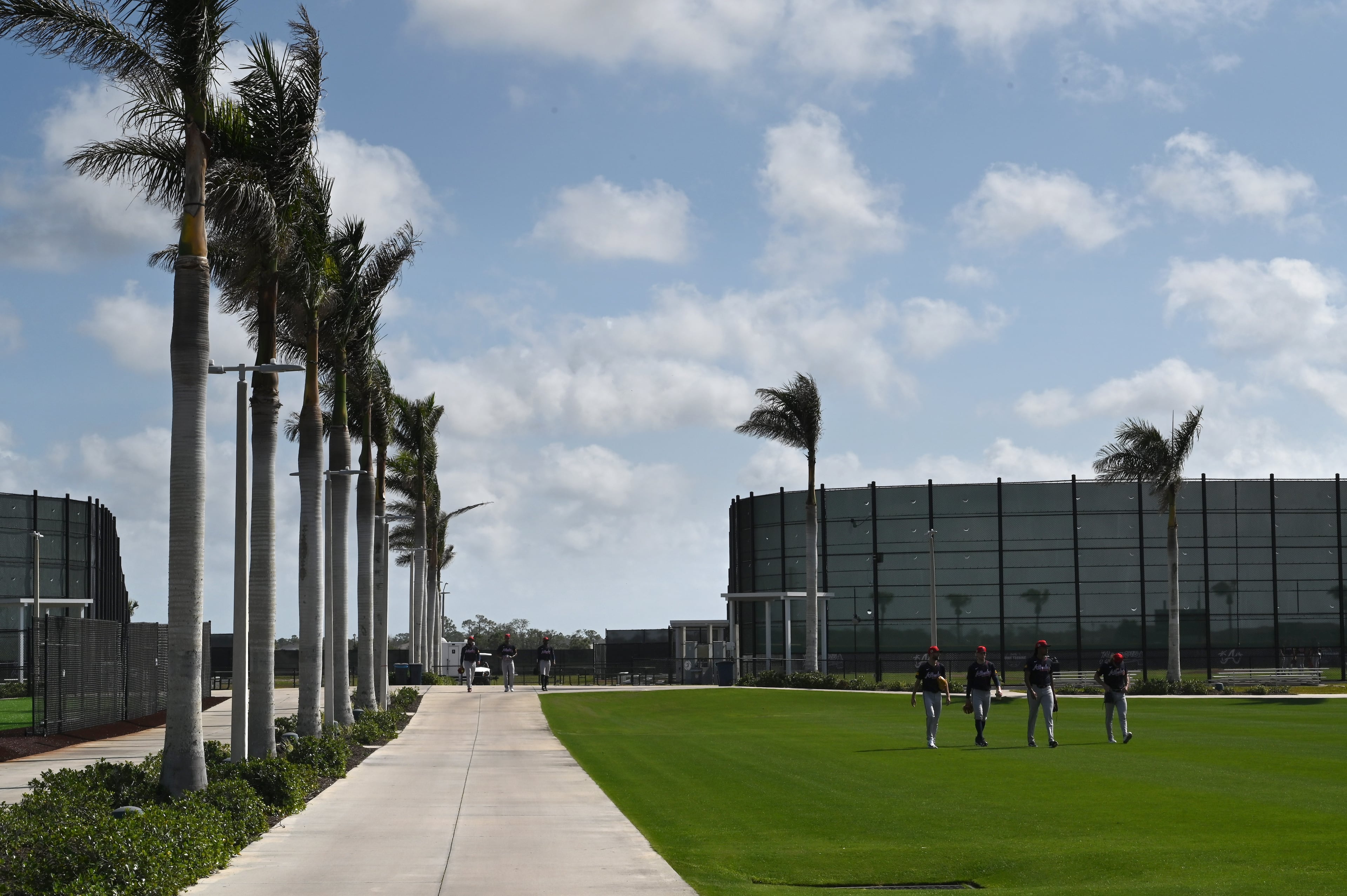 Atlanta Braves pitchers walk on practice field during spring training workouts at CoolToday Park, Thursday, February 13, 2025, North Port, Florida. (Hyosub Shin / AJC)